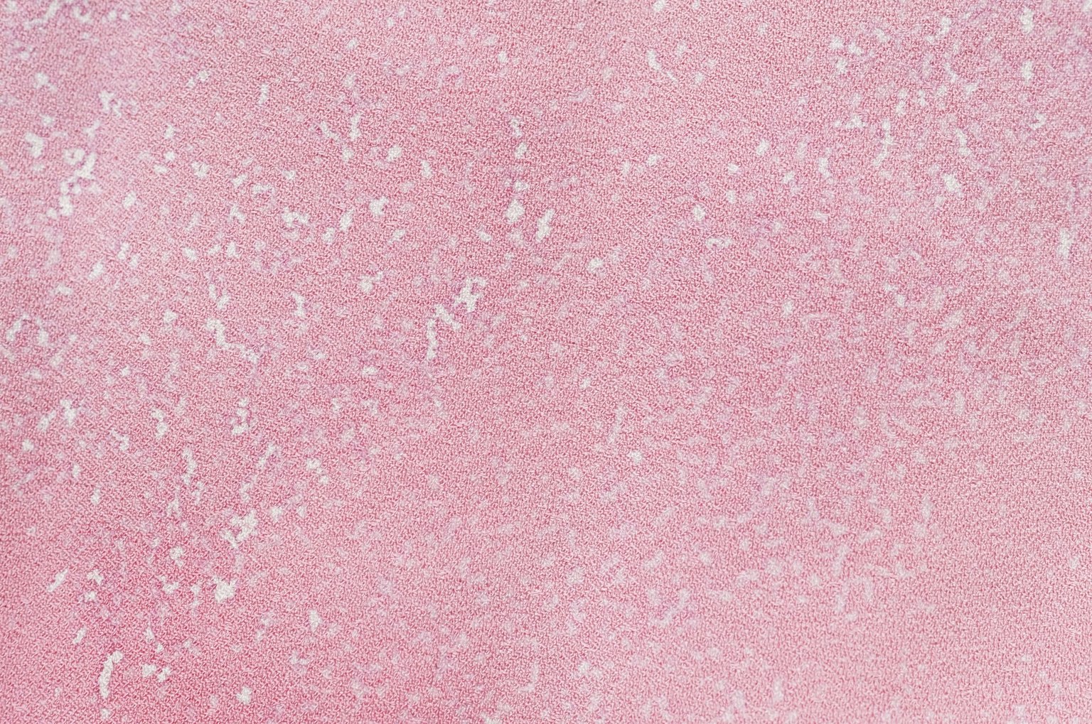 Fond rose doux avec une texture subtile