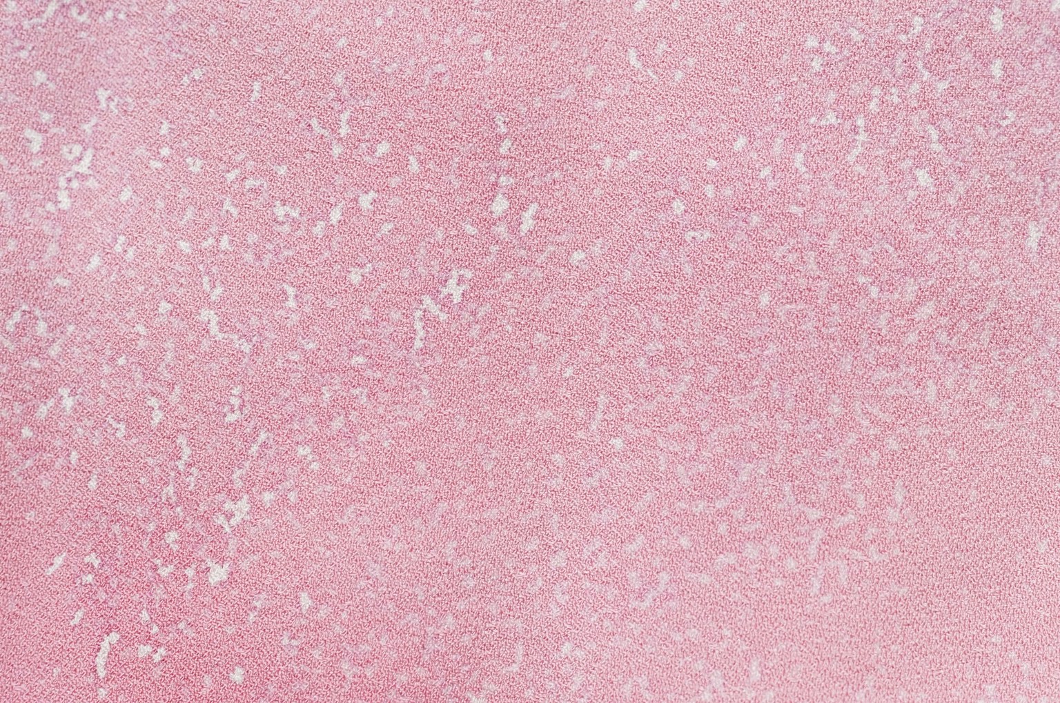 柔和的粉色背景带有细微纹理