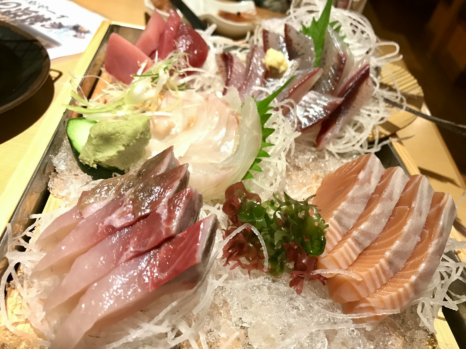 A beautiful arrangement of fresh sashimi served on ice