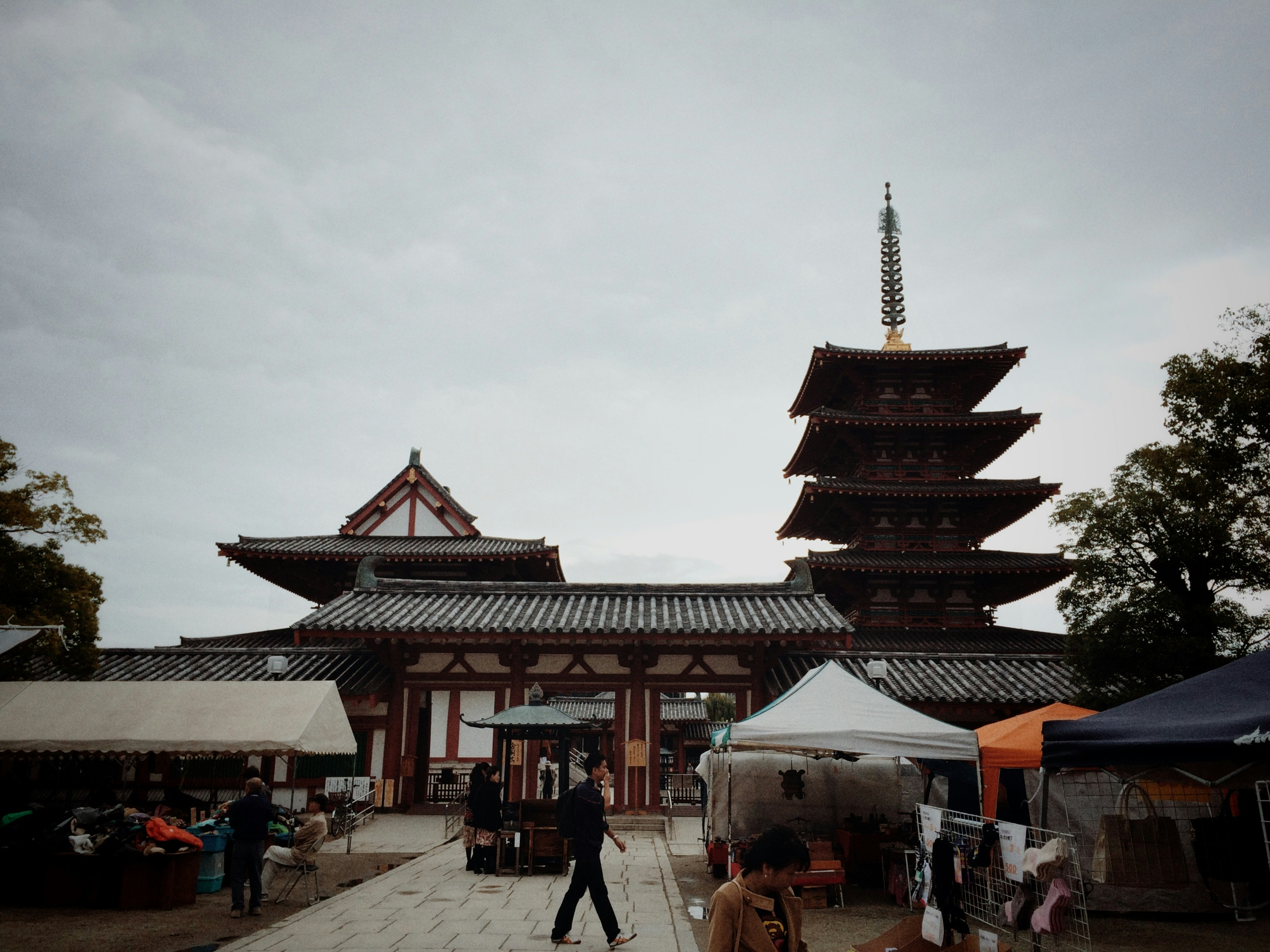 Temple approach with a pagoda and stalls, To-ji
