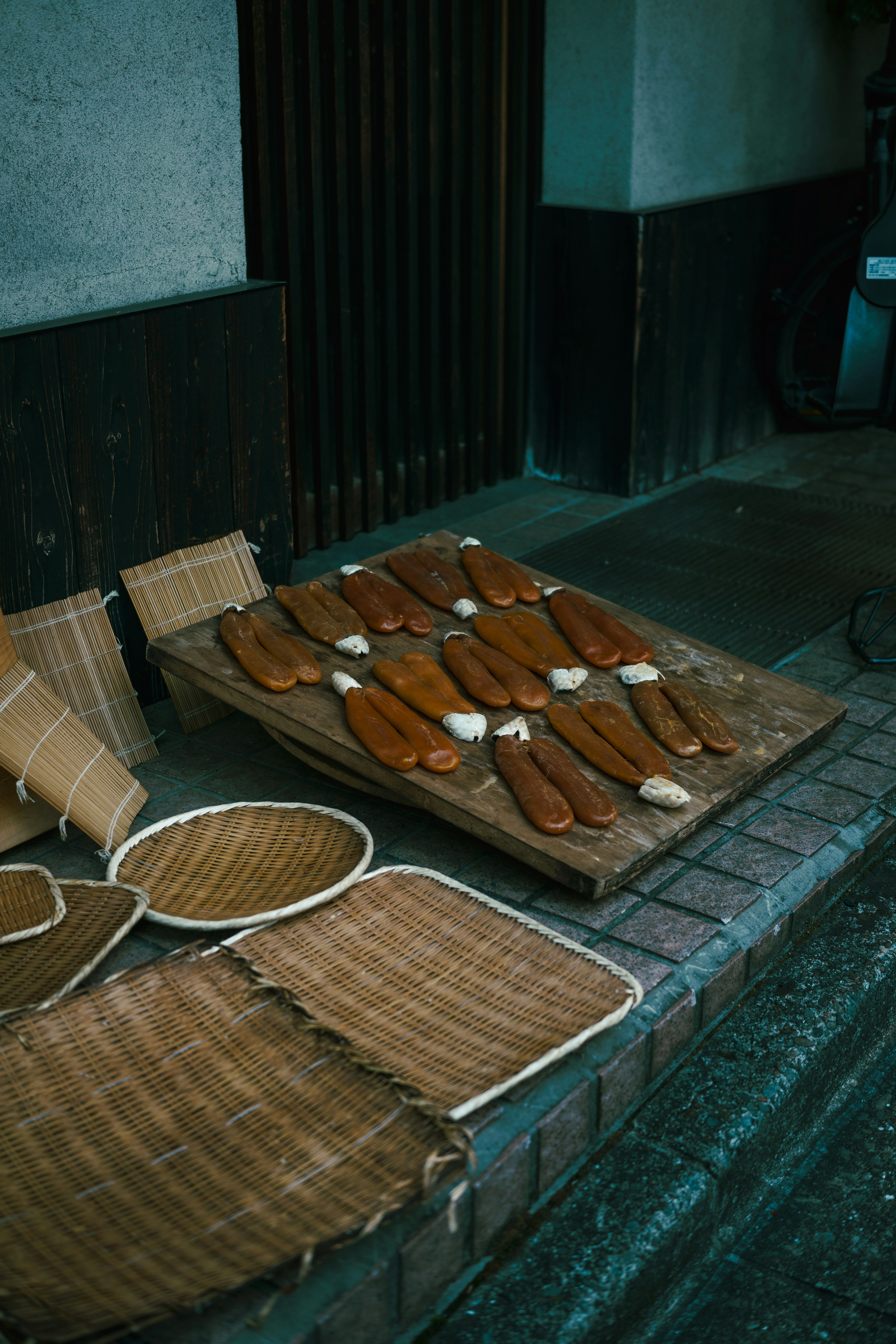 dried seafood (karasumi) laid out at a narrow shopfront