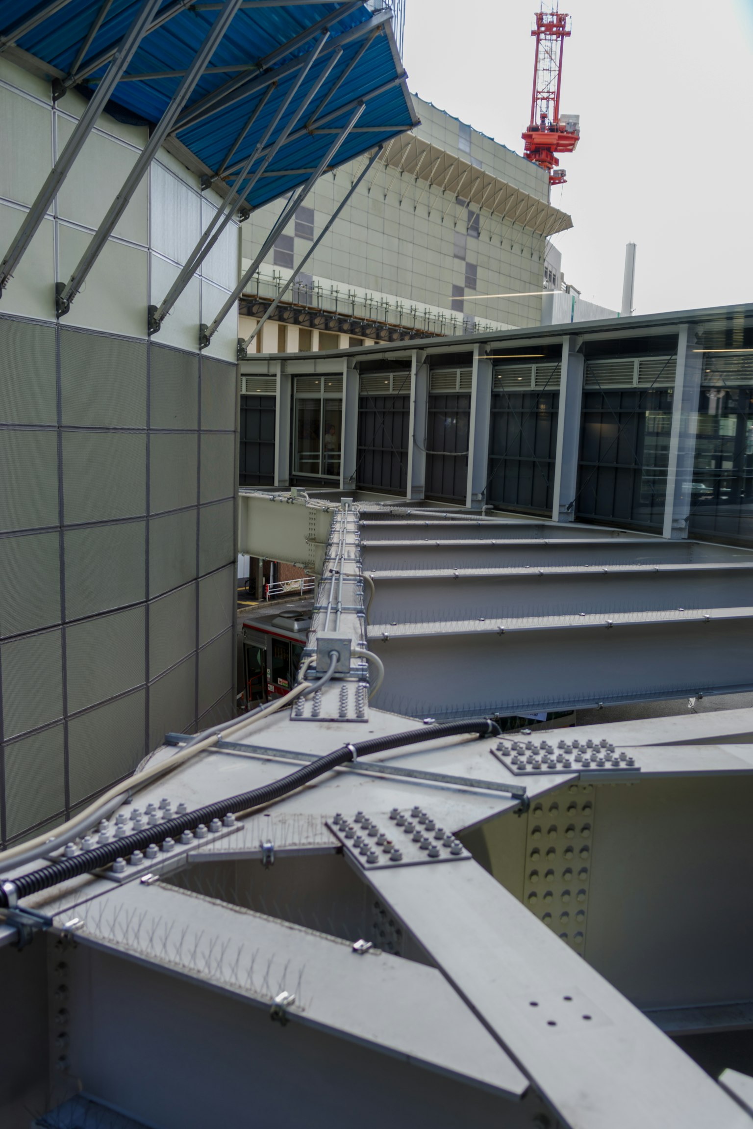 Metal structure and glass panels of a building rooftop