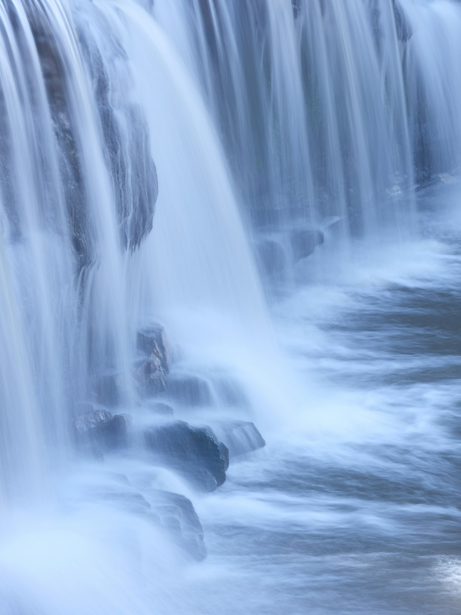 Close-up of a waterfall cascading over rocks