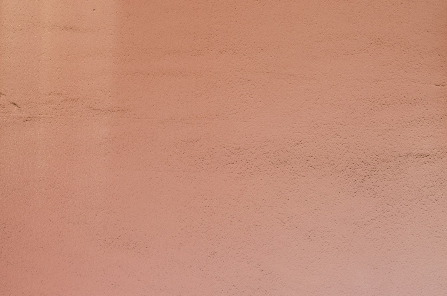 Superficie texturizzata di un muro arancione chiaro