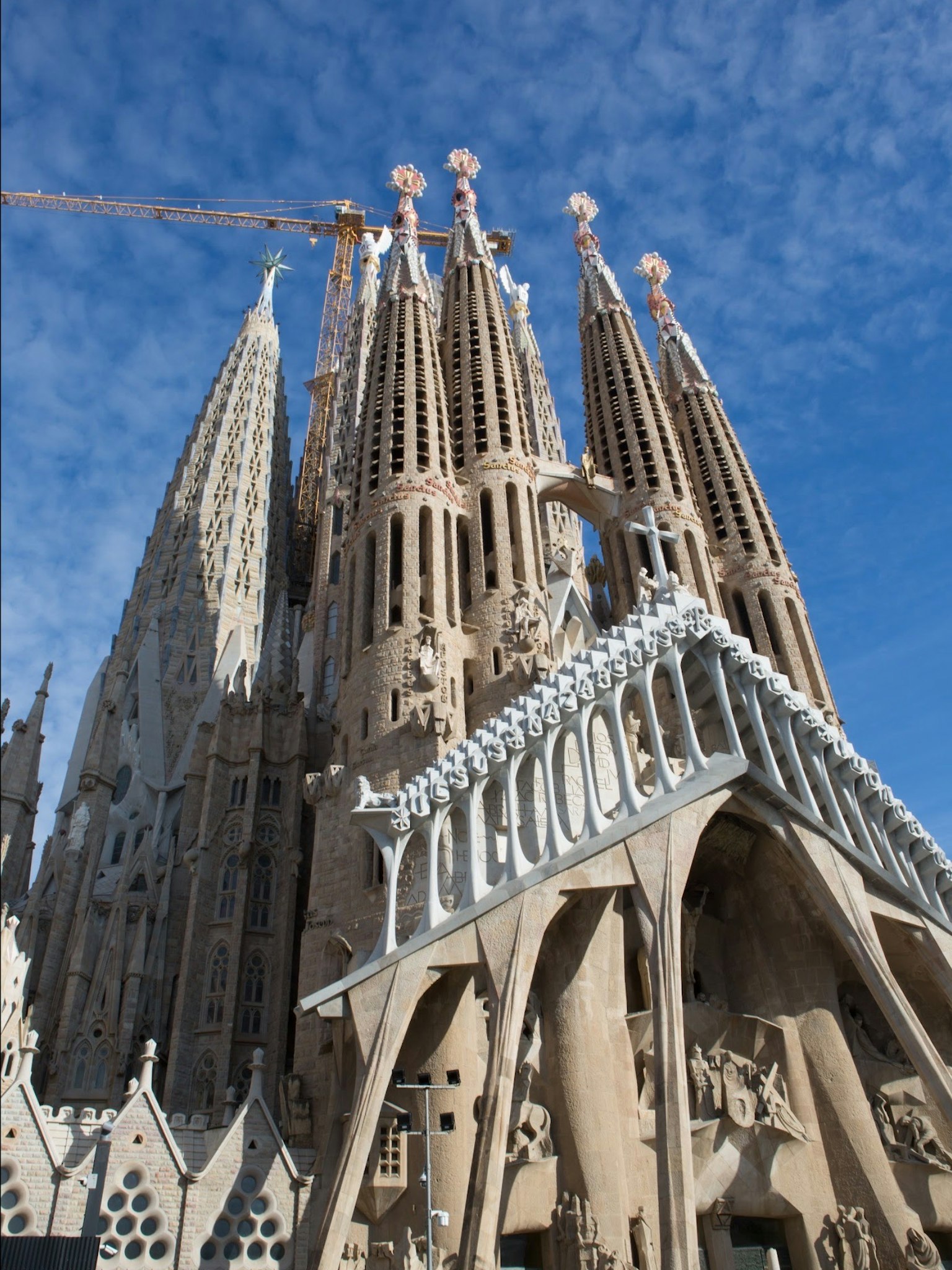 The majestic exterior of the Sagrada Familia featuring intricate towers
