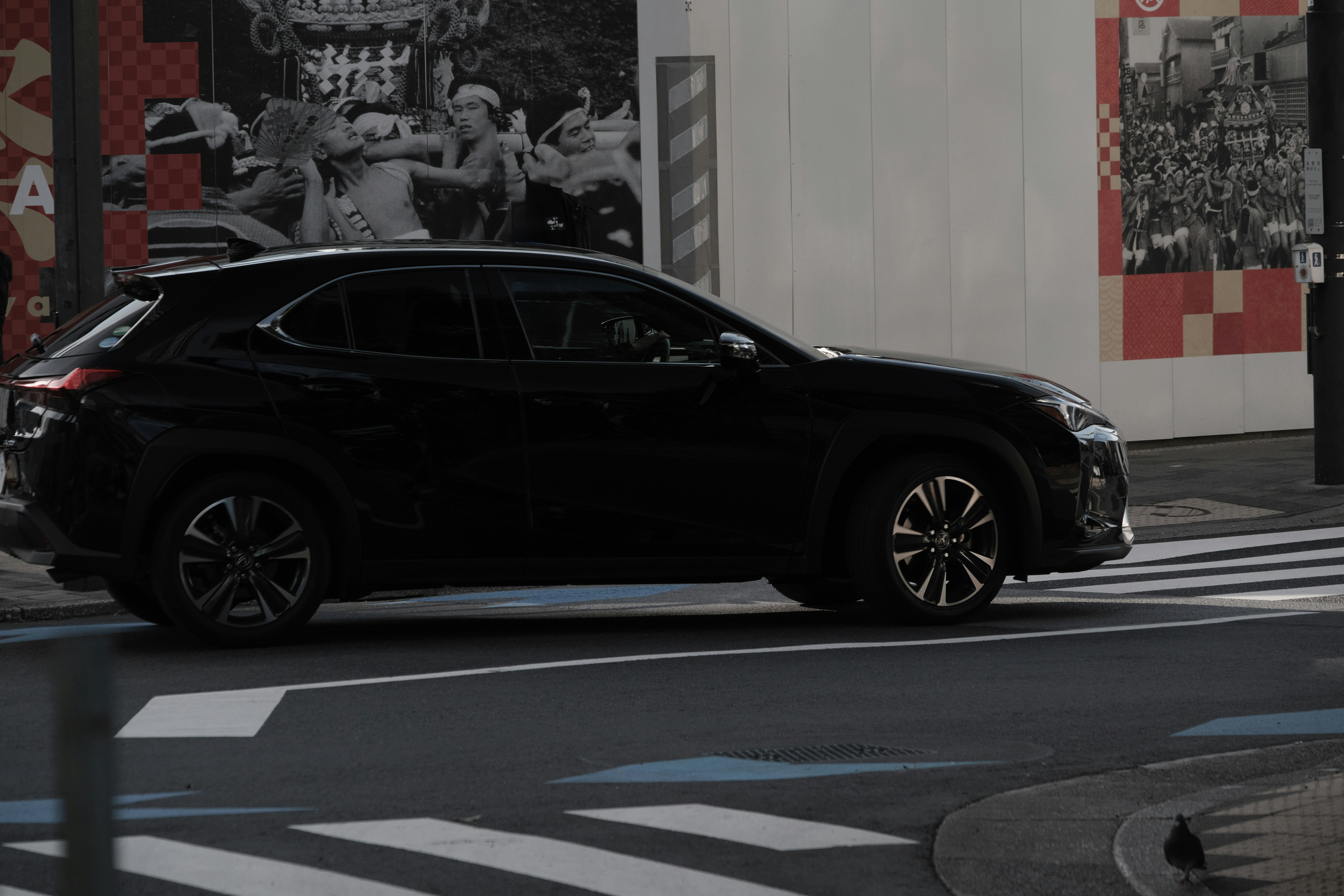Lexus car parked at a street corner in Japan