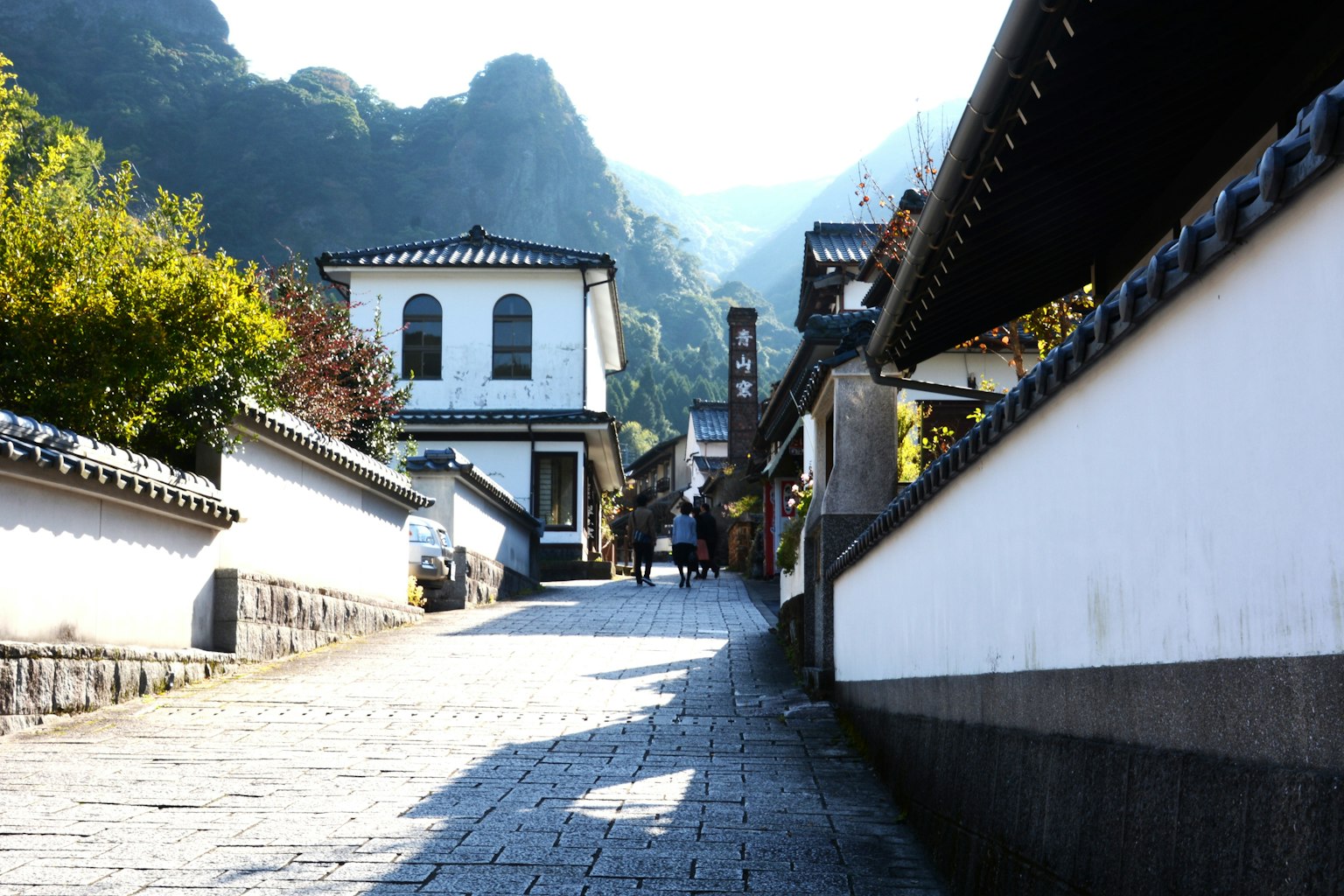 Scenic view of an old street surrounded by mountains