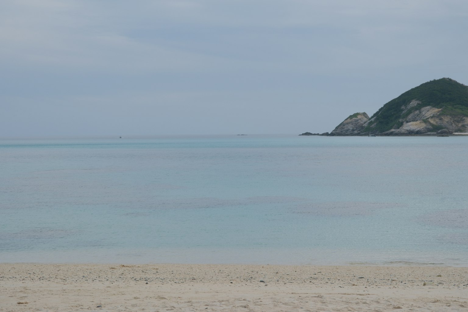 Calm sea and blue sky over a beach landscape