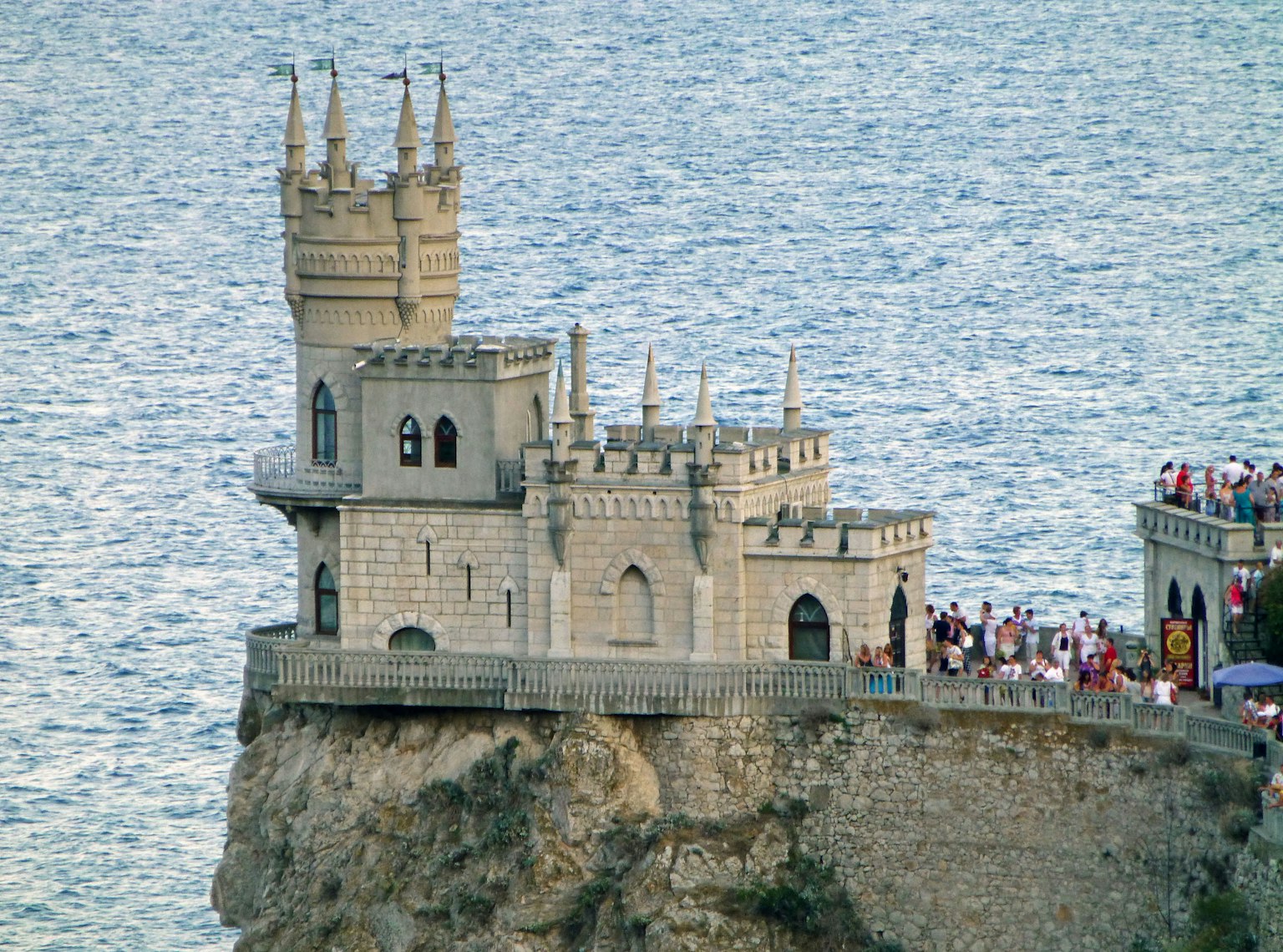 A picturesque castle perched on a cliff by the sea