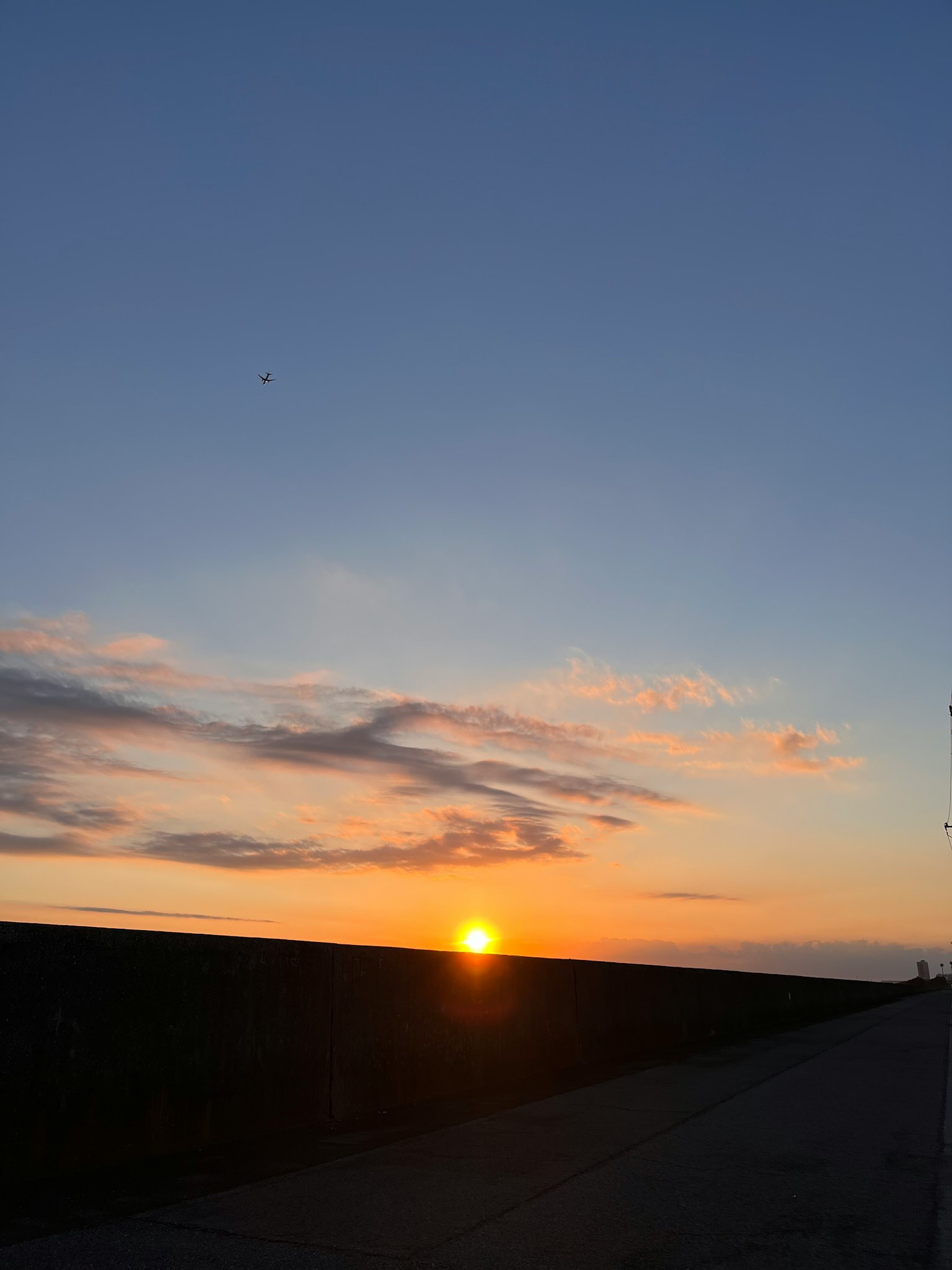 Beautiful sunset sky with clouds and horizon