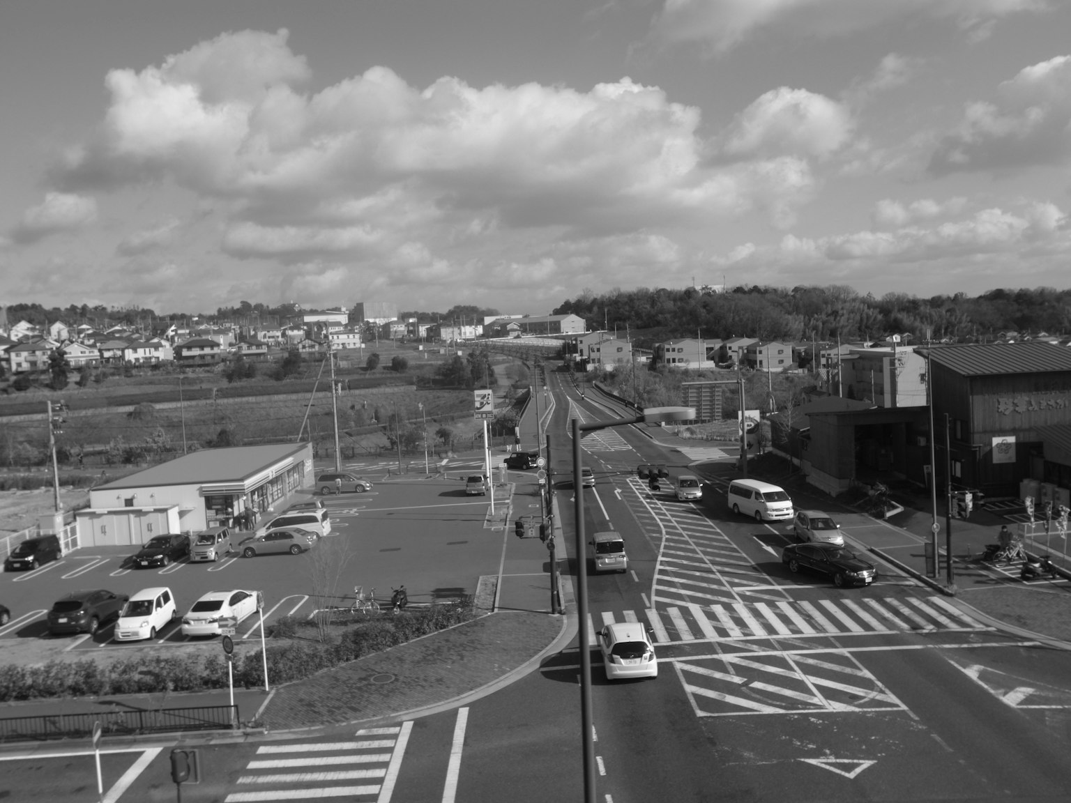 Black and white landscape photo showing intersections and roads