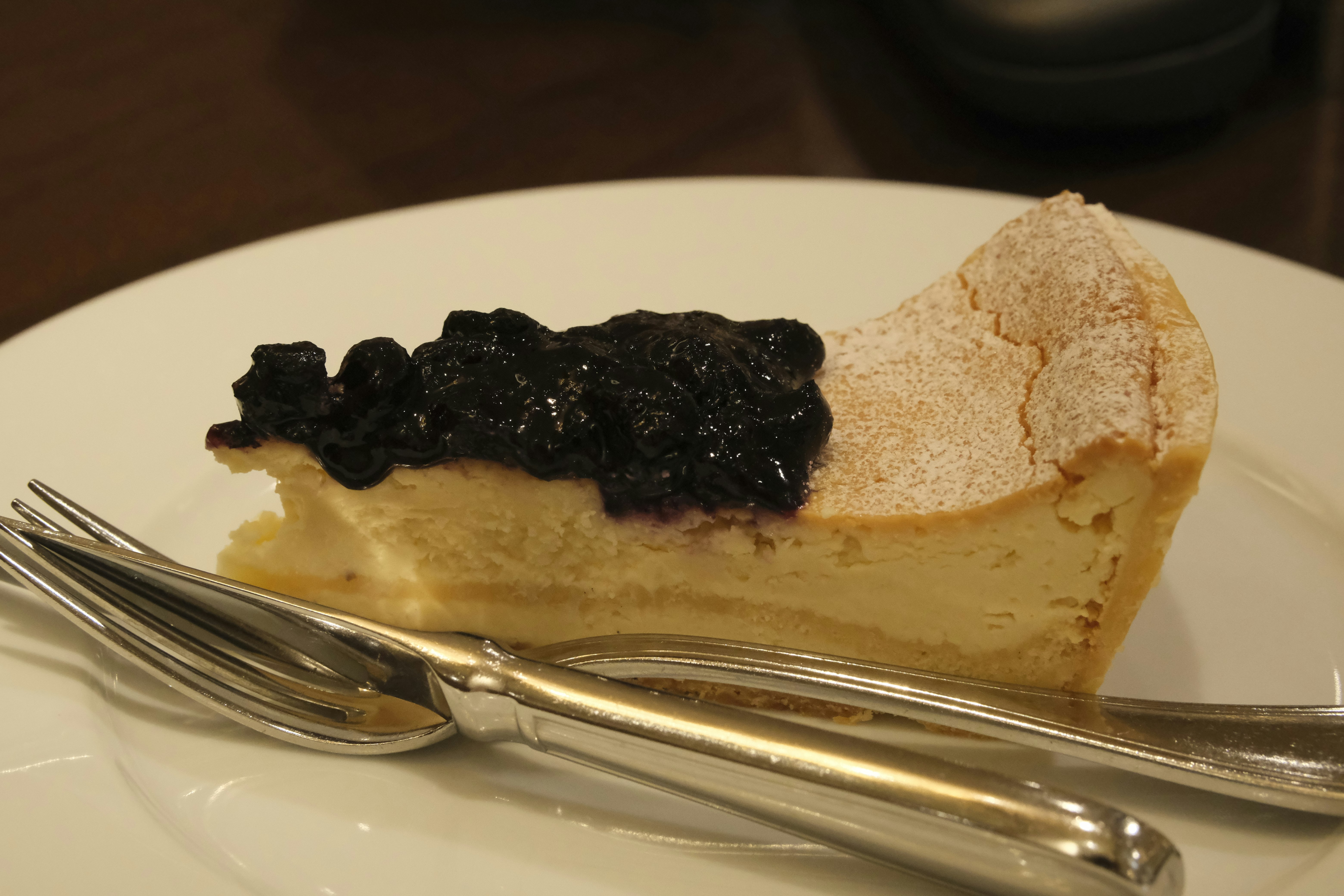 slice of cheesecake with blueberry topping
