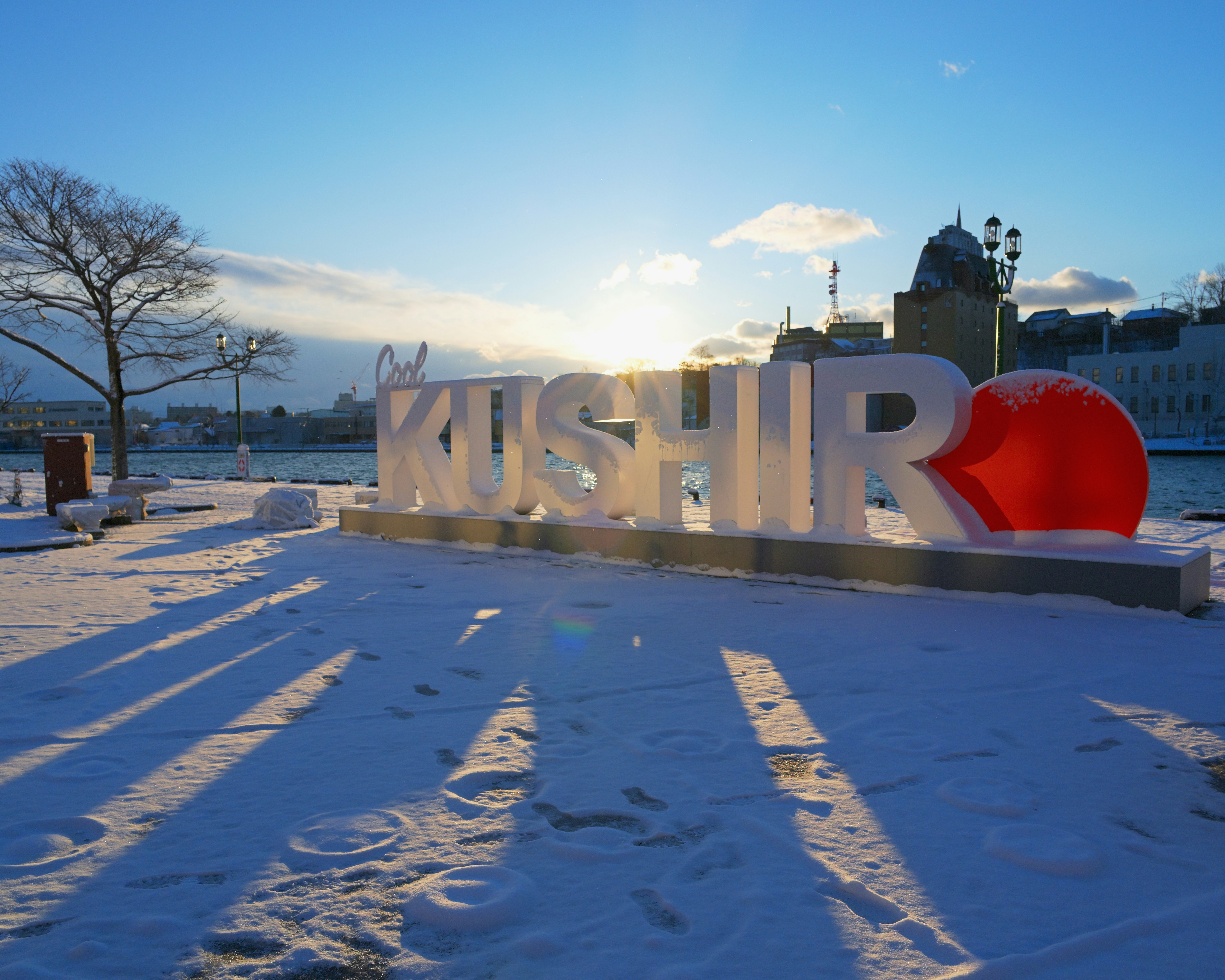 Kushiro city snowy scene with a “KUSHIRO” letter monument
