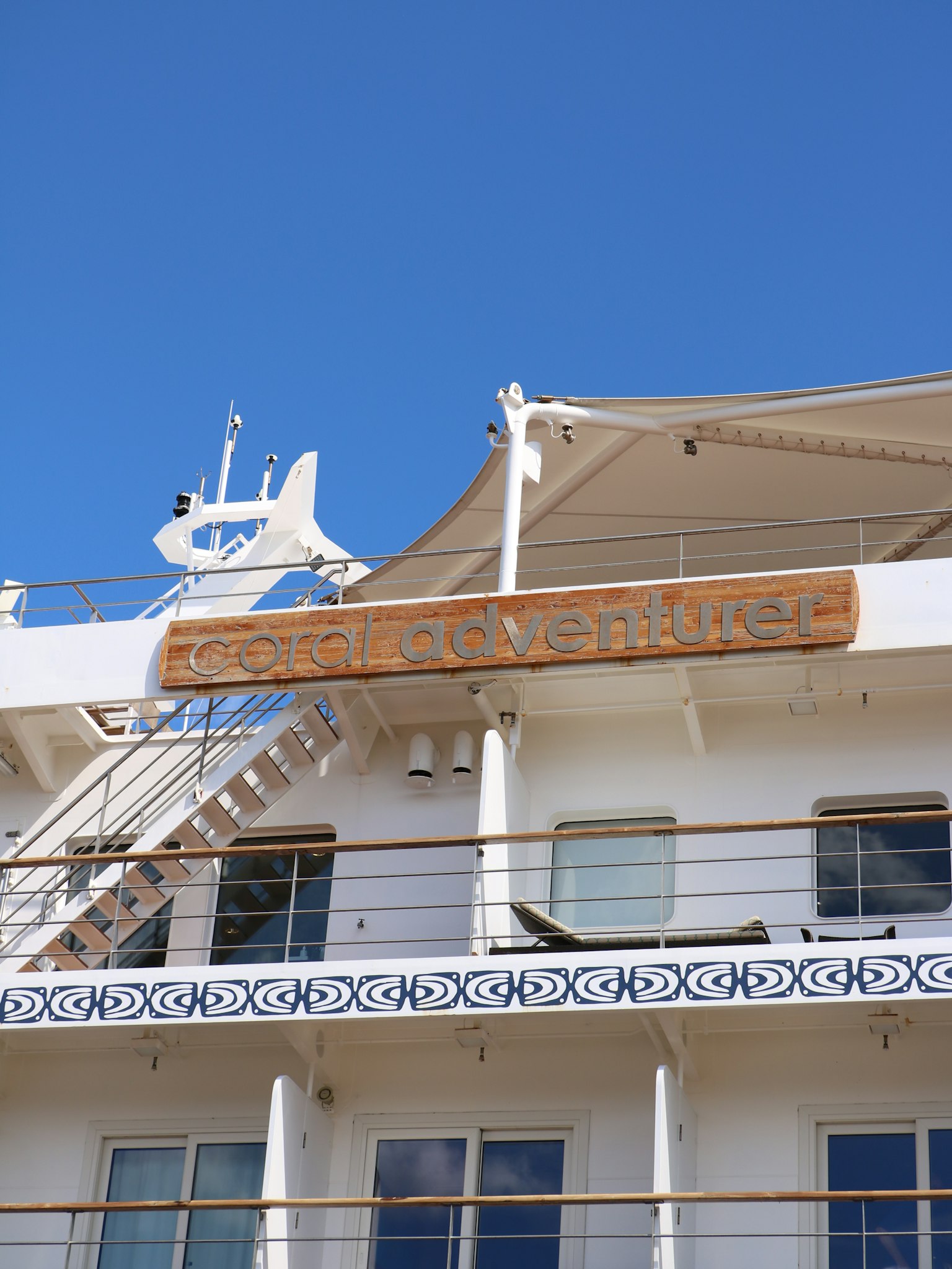 Sign reading SPIRIT OF DISCOVERY on the side of a white ship