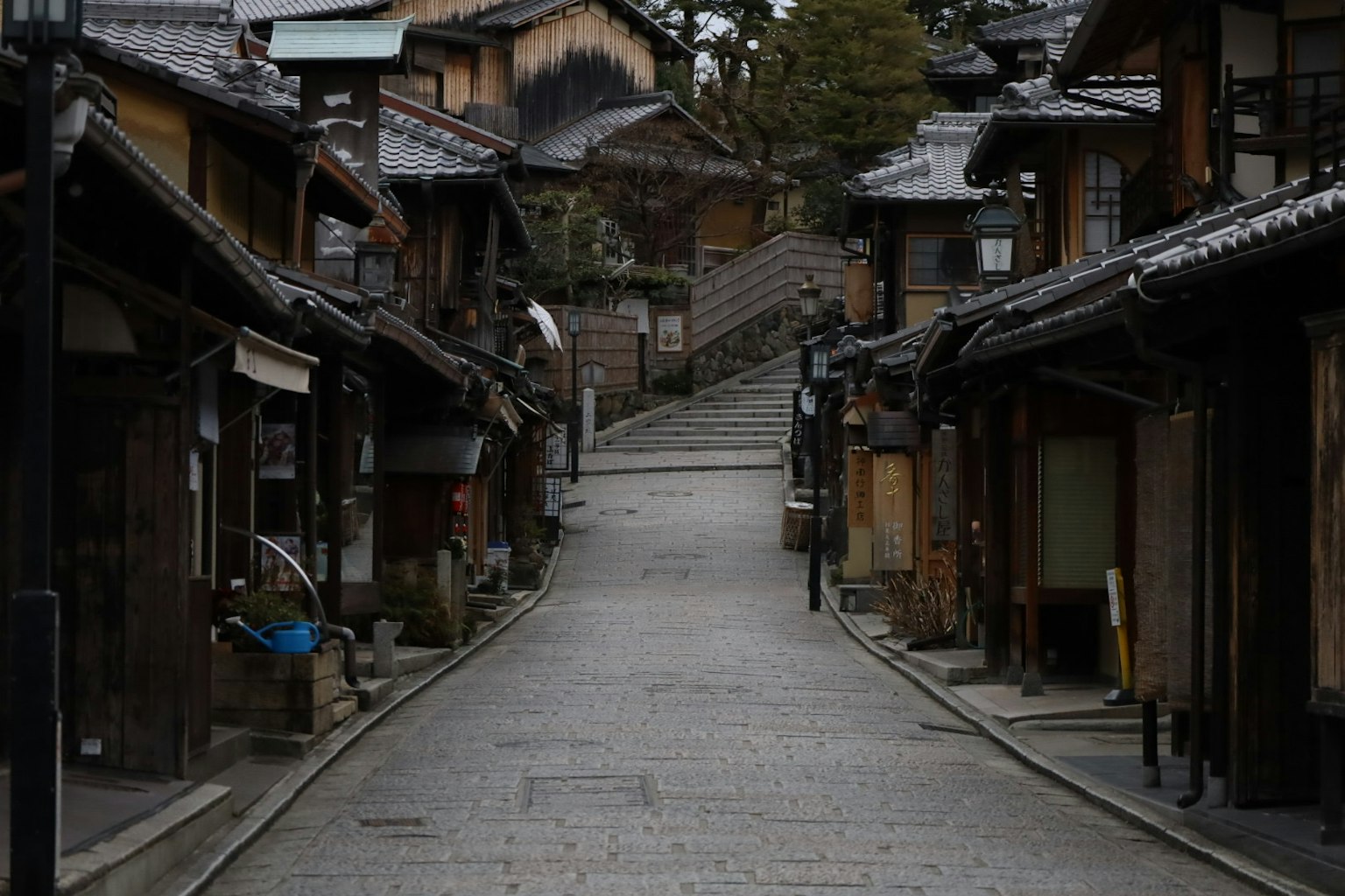 Quiet old street with stone pavement and traditional wooden buildings