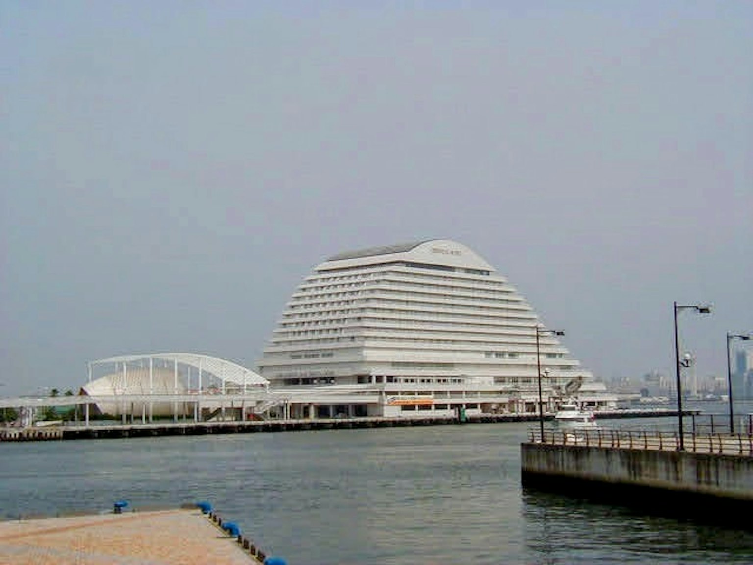 Modern buildings facing the sea with white architectural designs