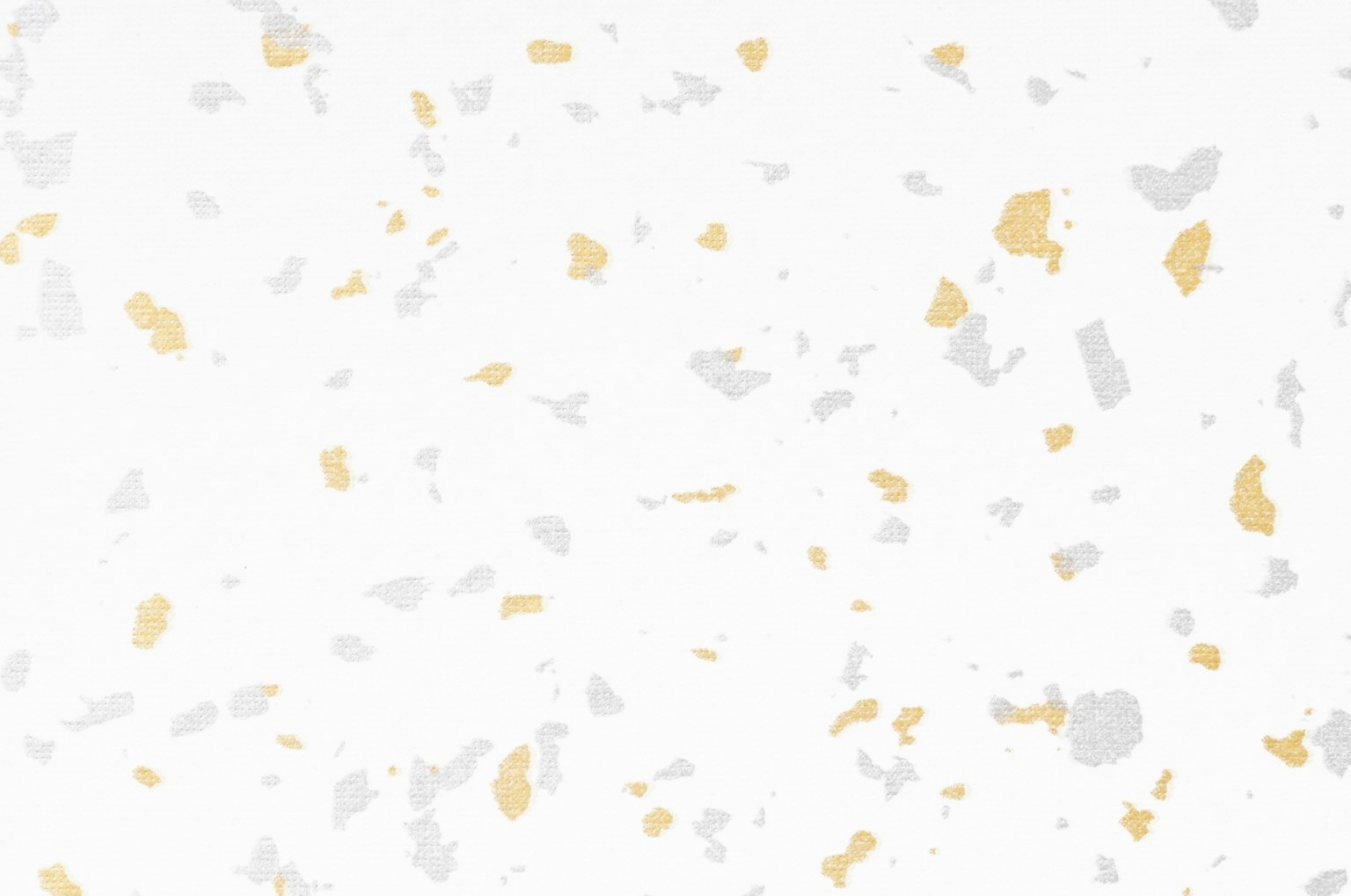 Texture with scattered gold and gray speckles on a white background