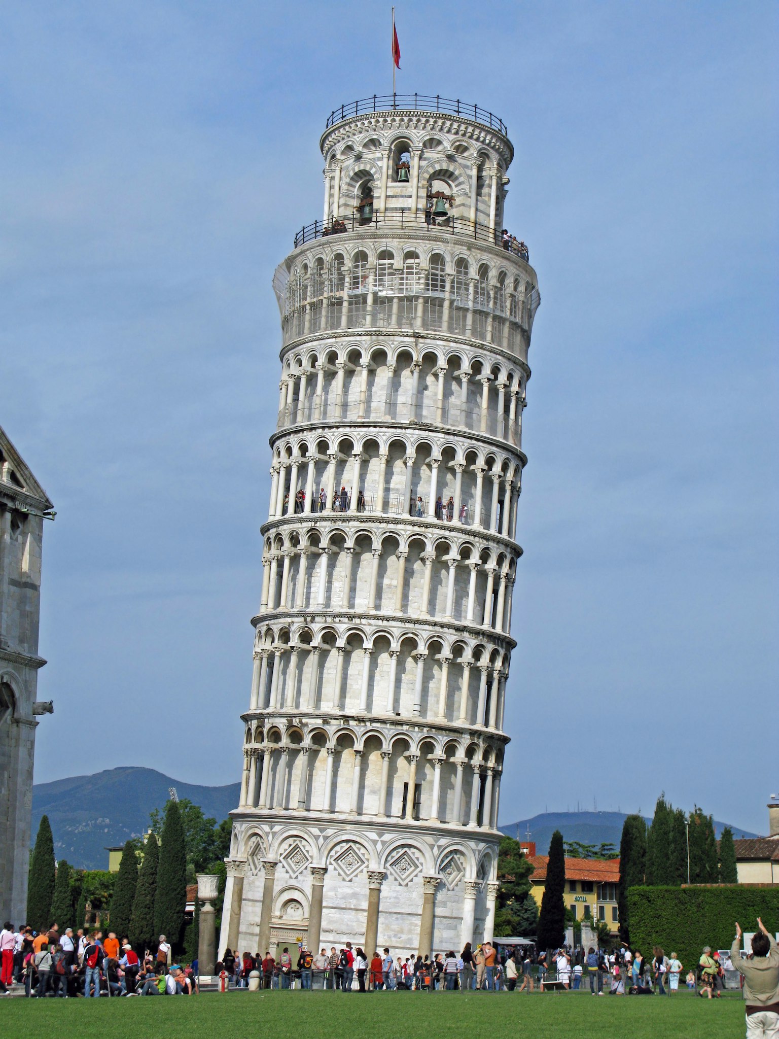 Leaning Tower of Pisa with tourists gathered around
