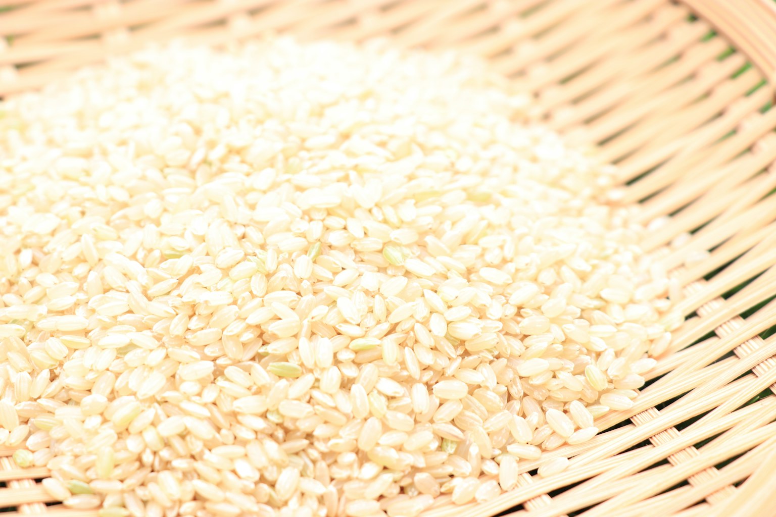 Close-up of white sesame seeds in a woven basket
