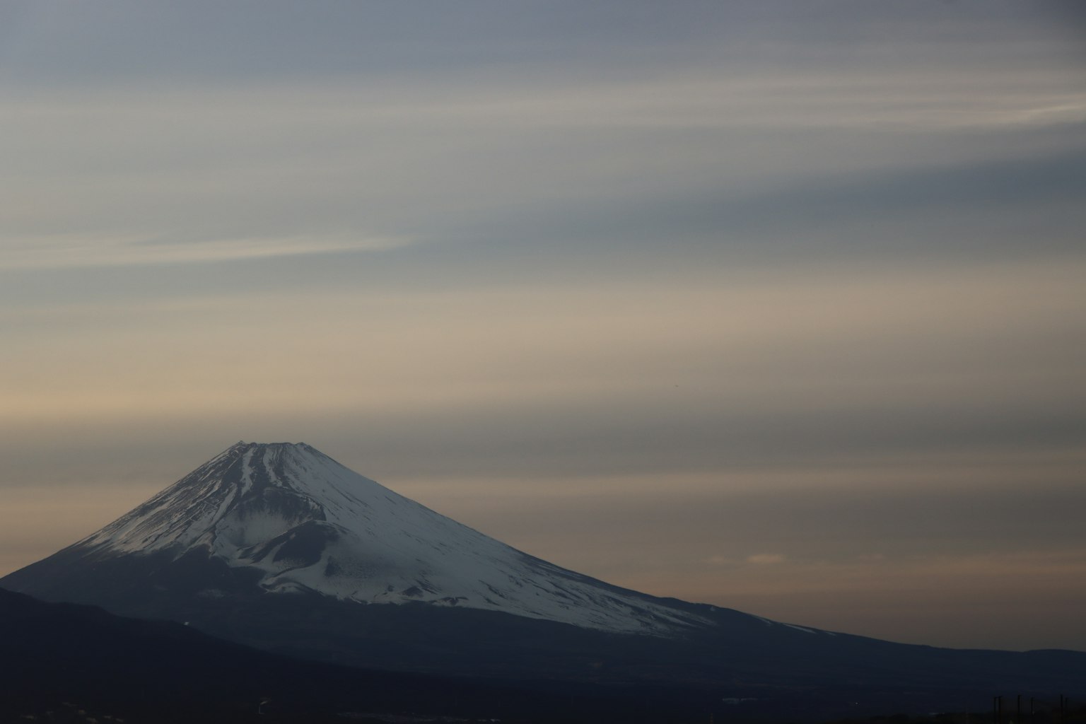 Serene view of Mount Fuji with a snow-capped peak