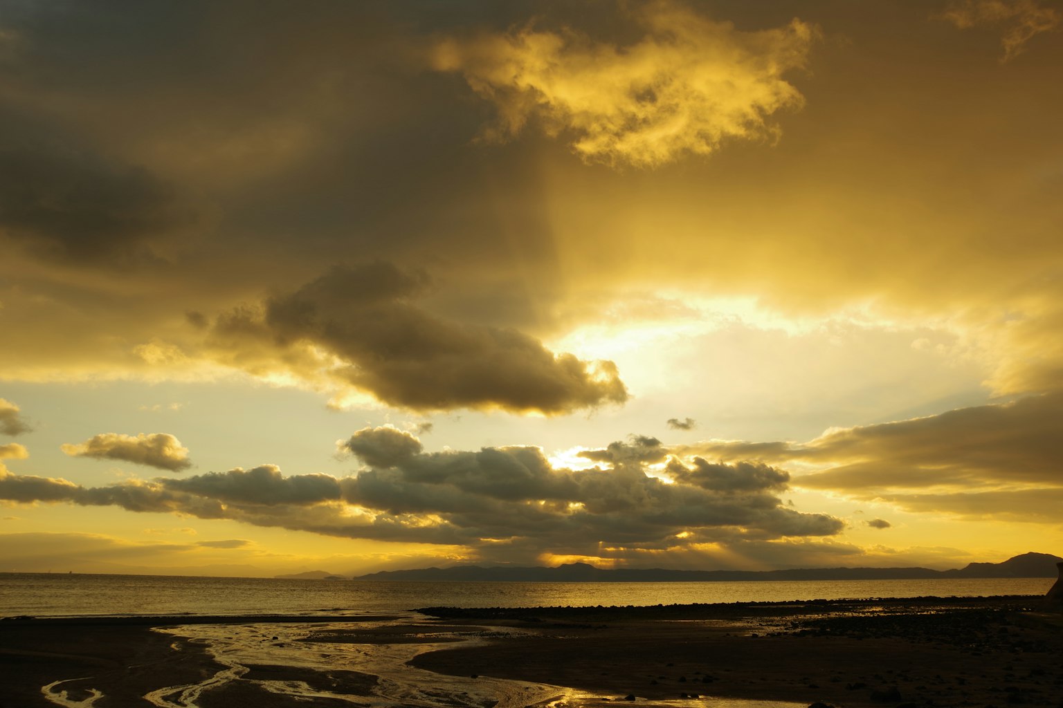 Beautiful sunset over the sea with dramatic clouds