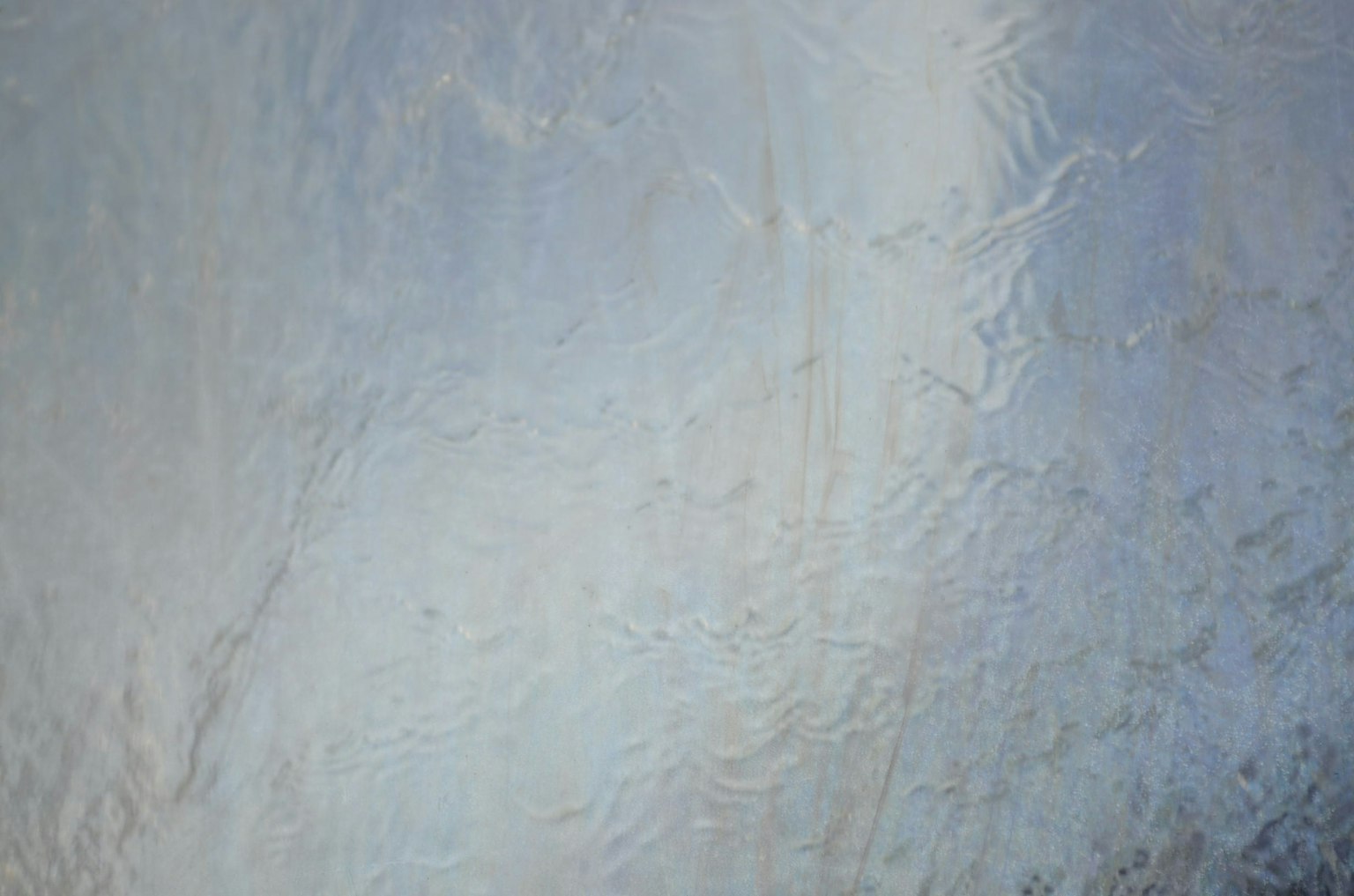 Texture abstraite aux tons bleuâtres et blancs