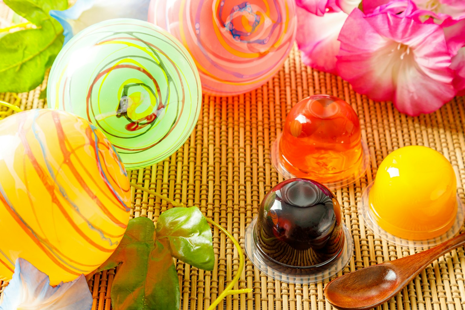 Colorful jellies and flowers arranged on a beautiful table setting
