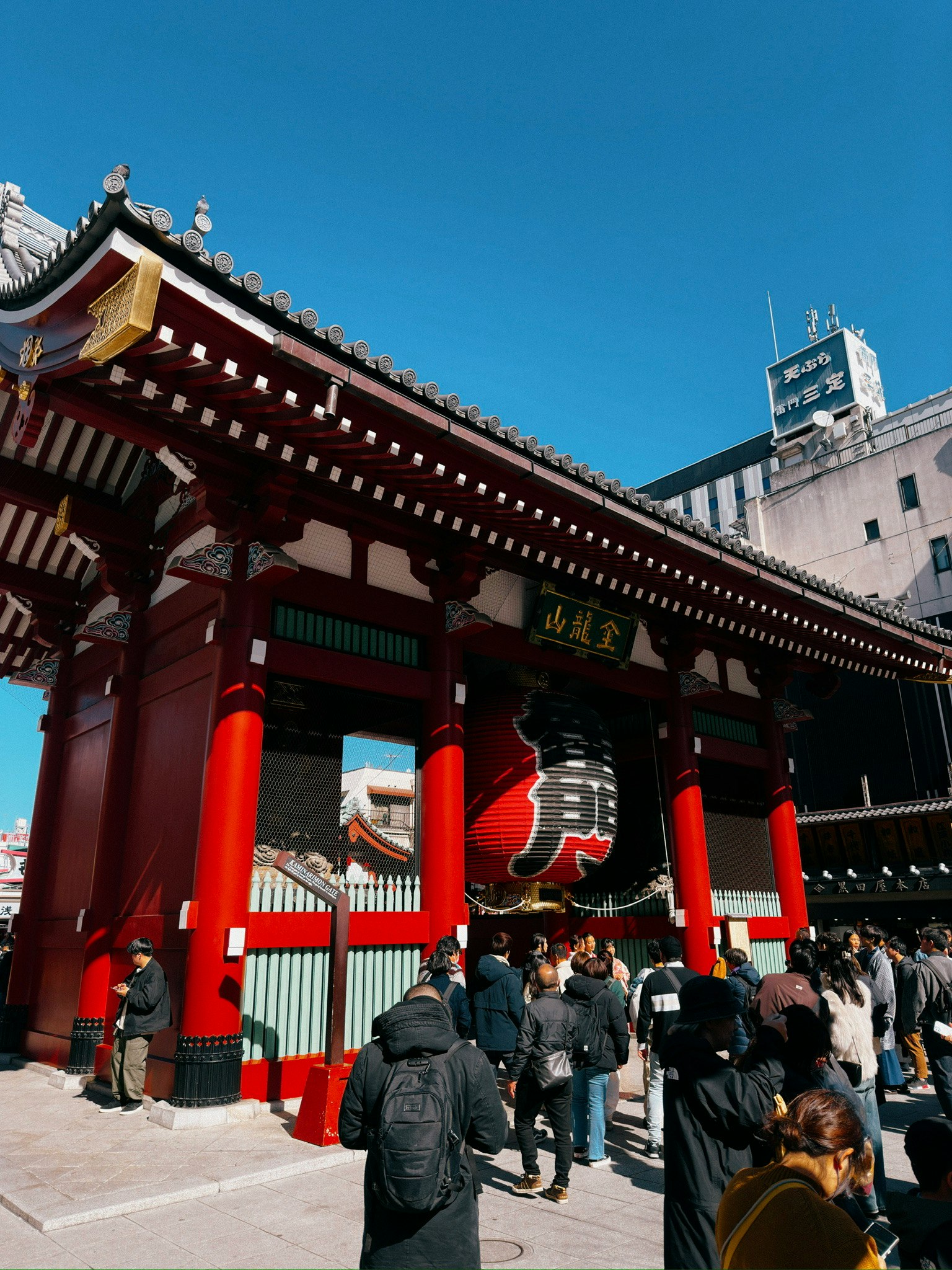 Senso-ji Temple's Kaminarimon Gate with crowds of visitors