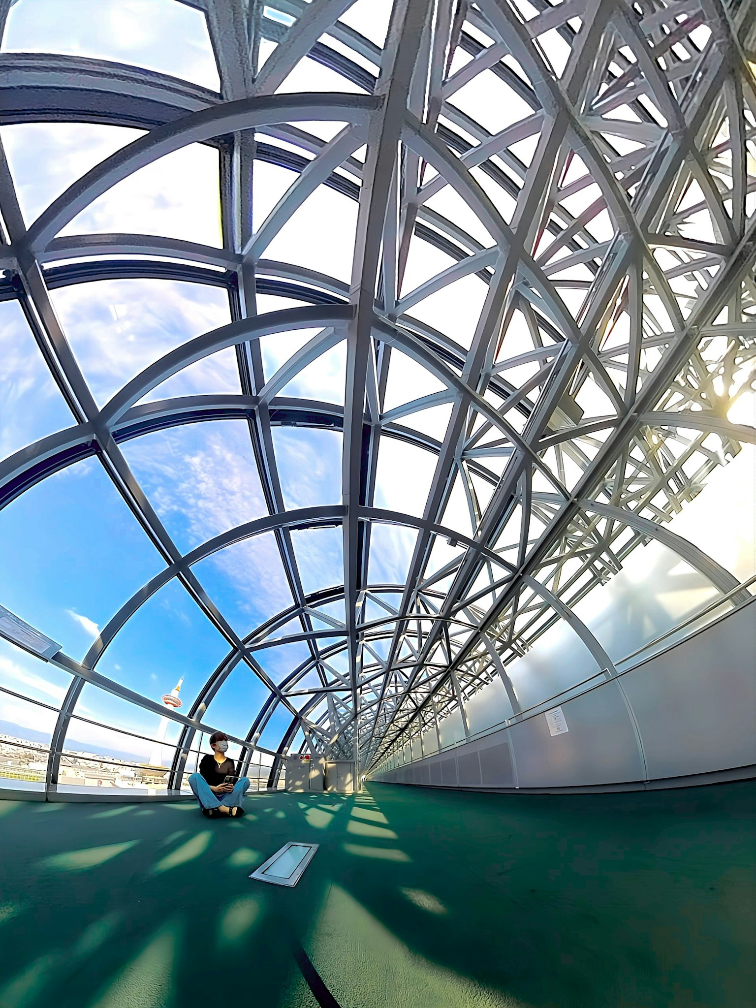 Interior view of a modern tunnel with a transparent roof