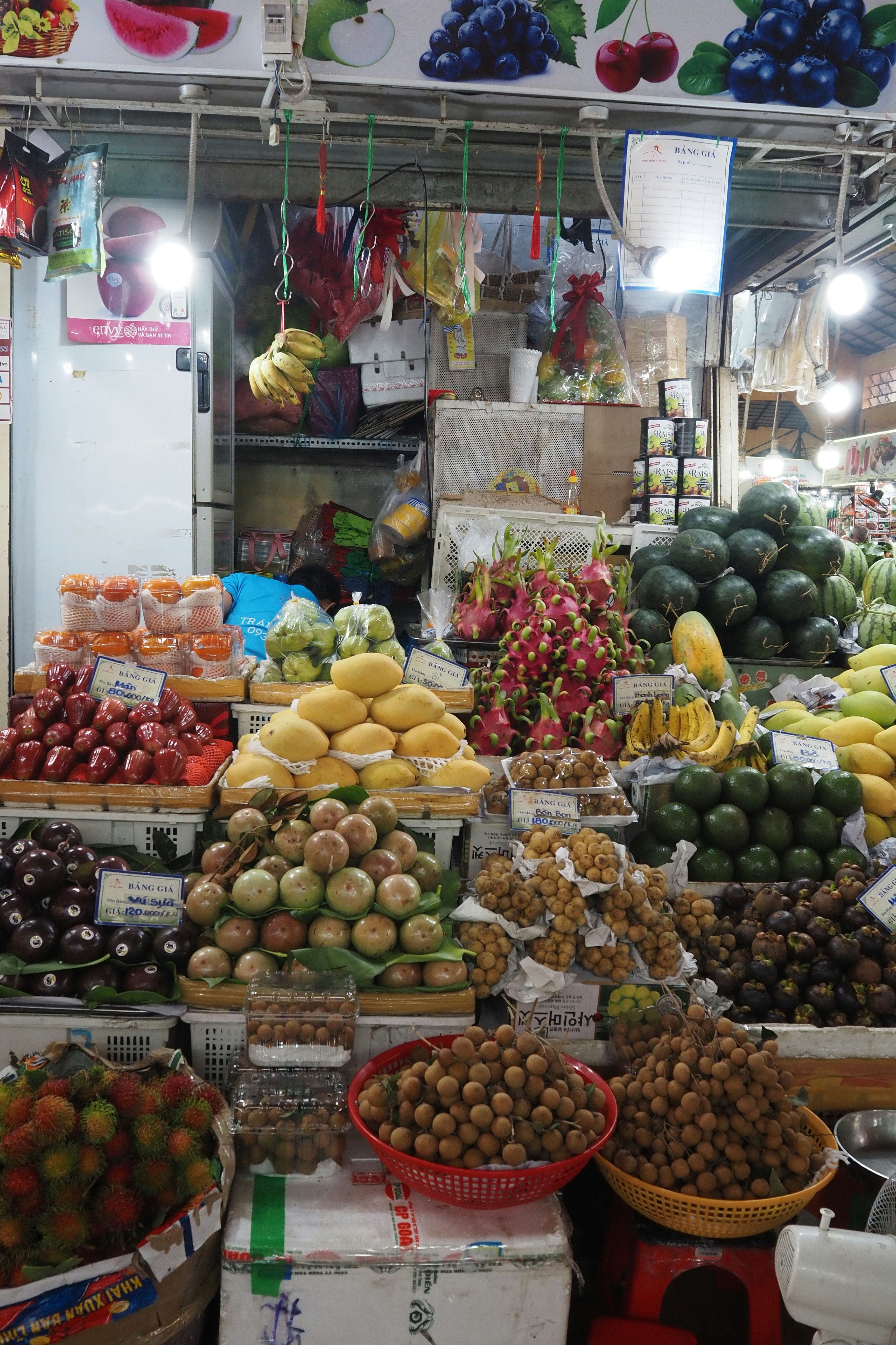 indoor produce stall with piled fruit
