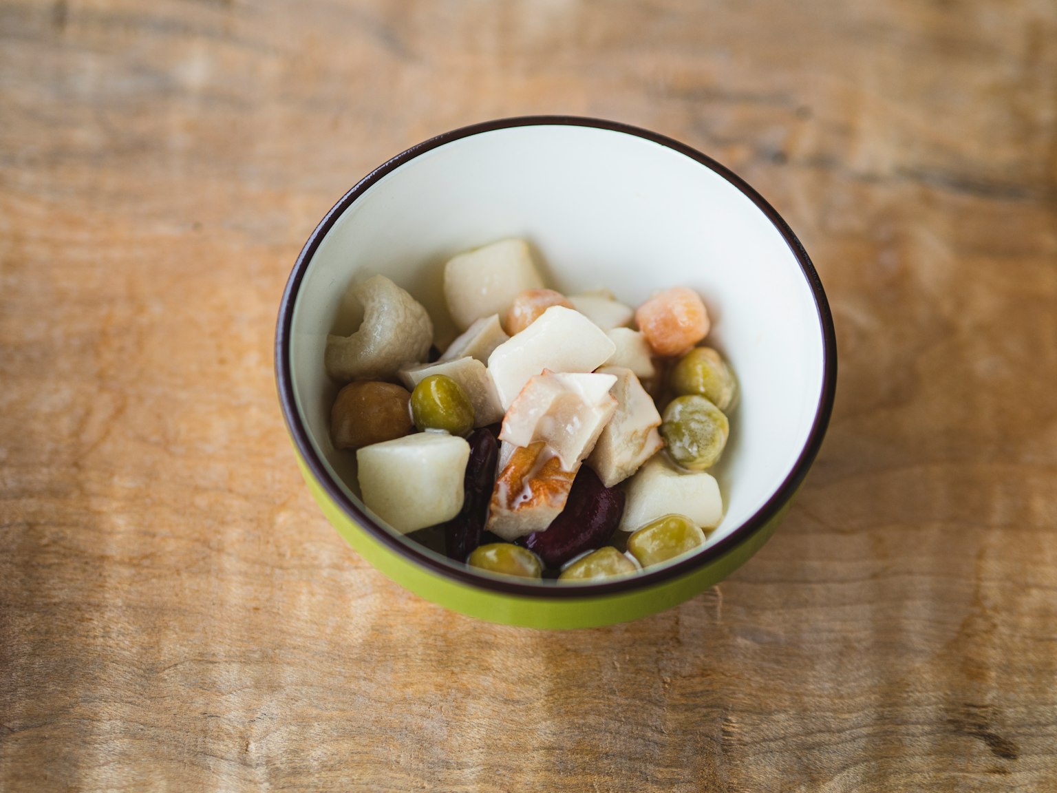 An assortment of ingredients in a small white bowl