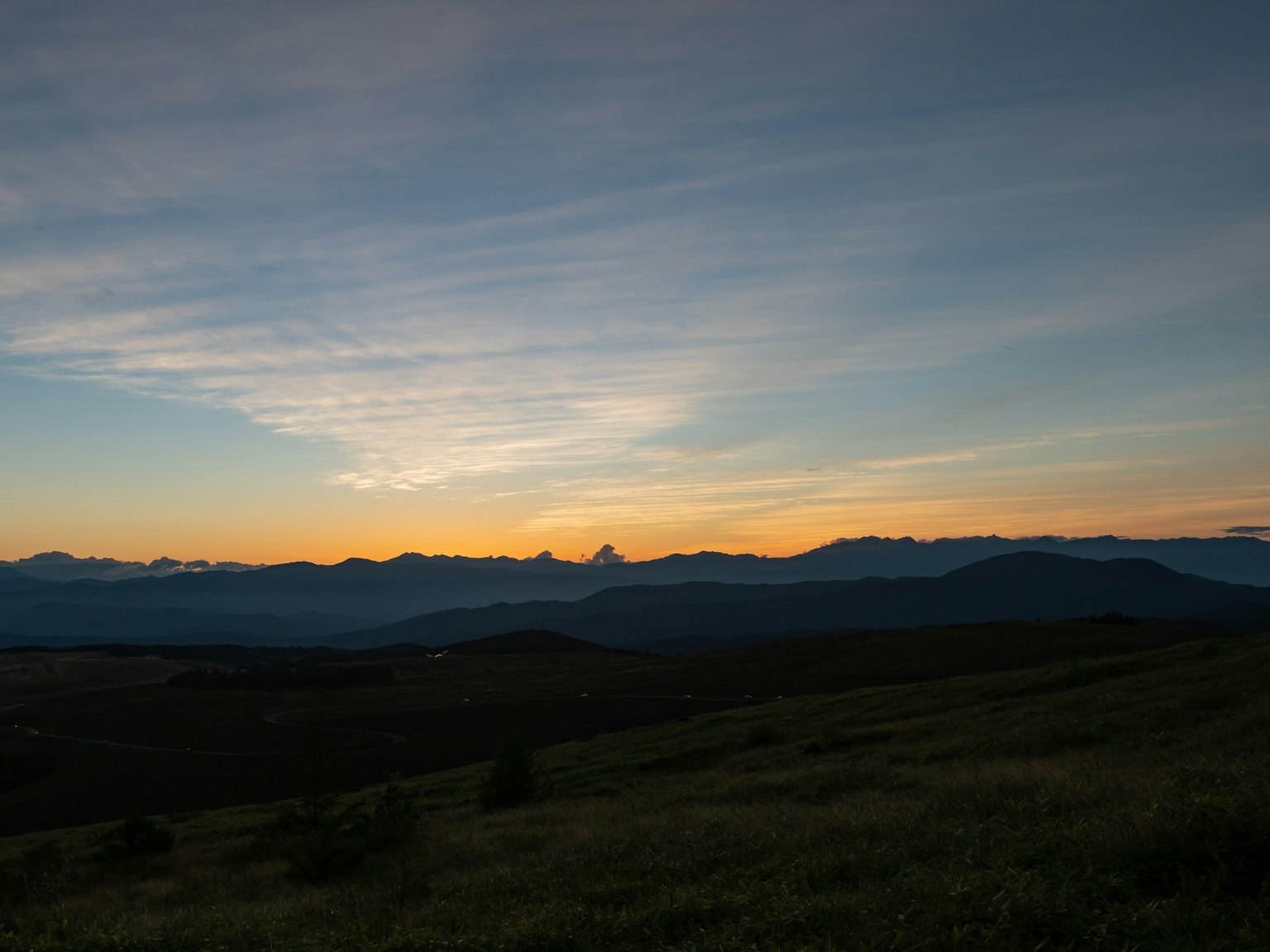 Beautiful mountain landscape at sunset with blue sky