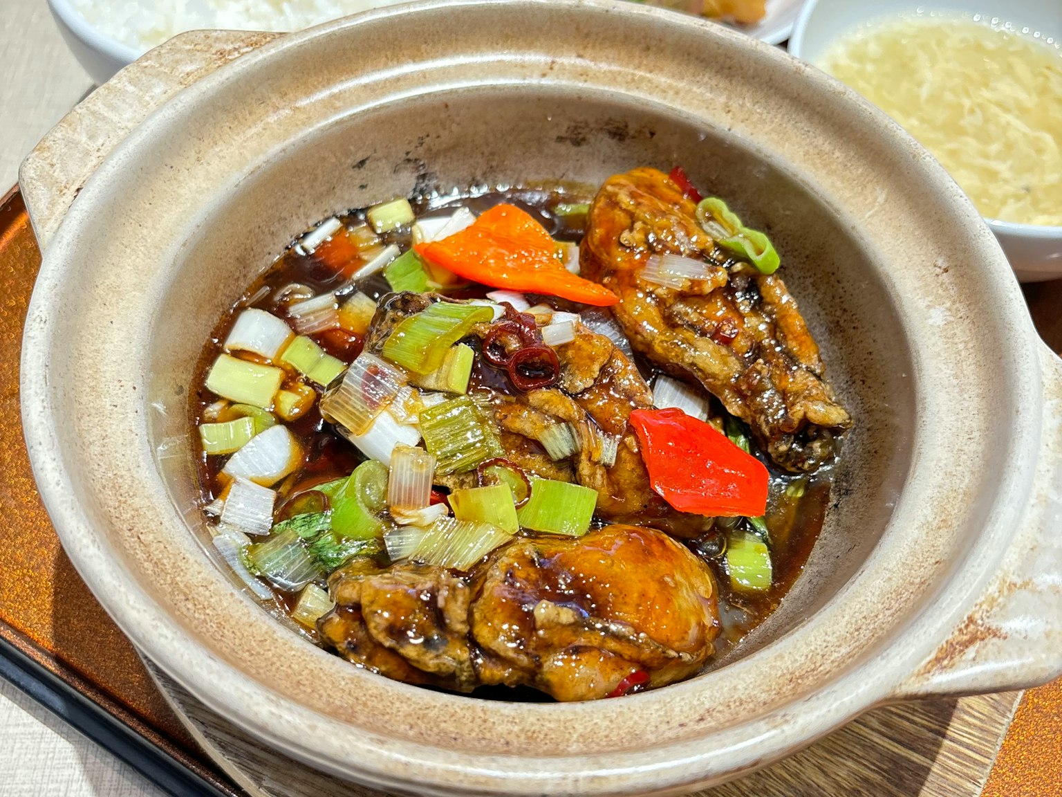 Clay pot dish with chicken and vegetables