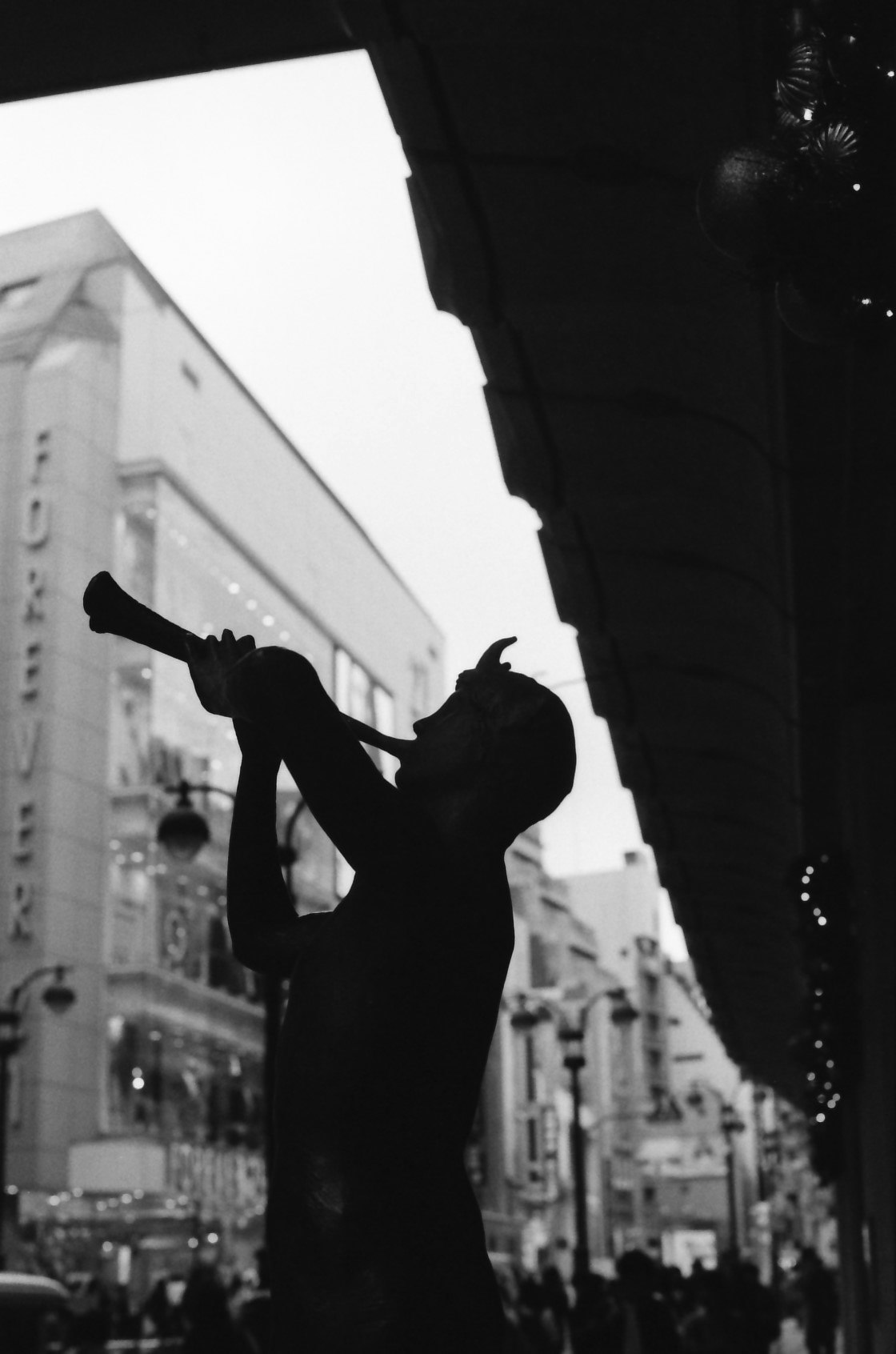 silhouette dancer posing on a night street