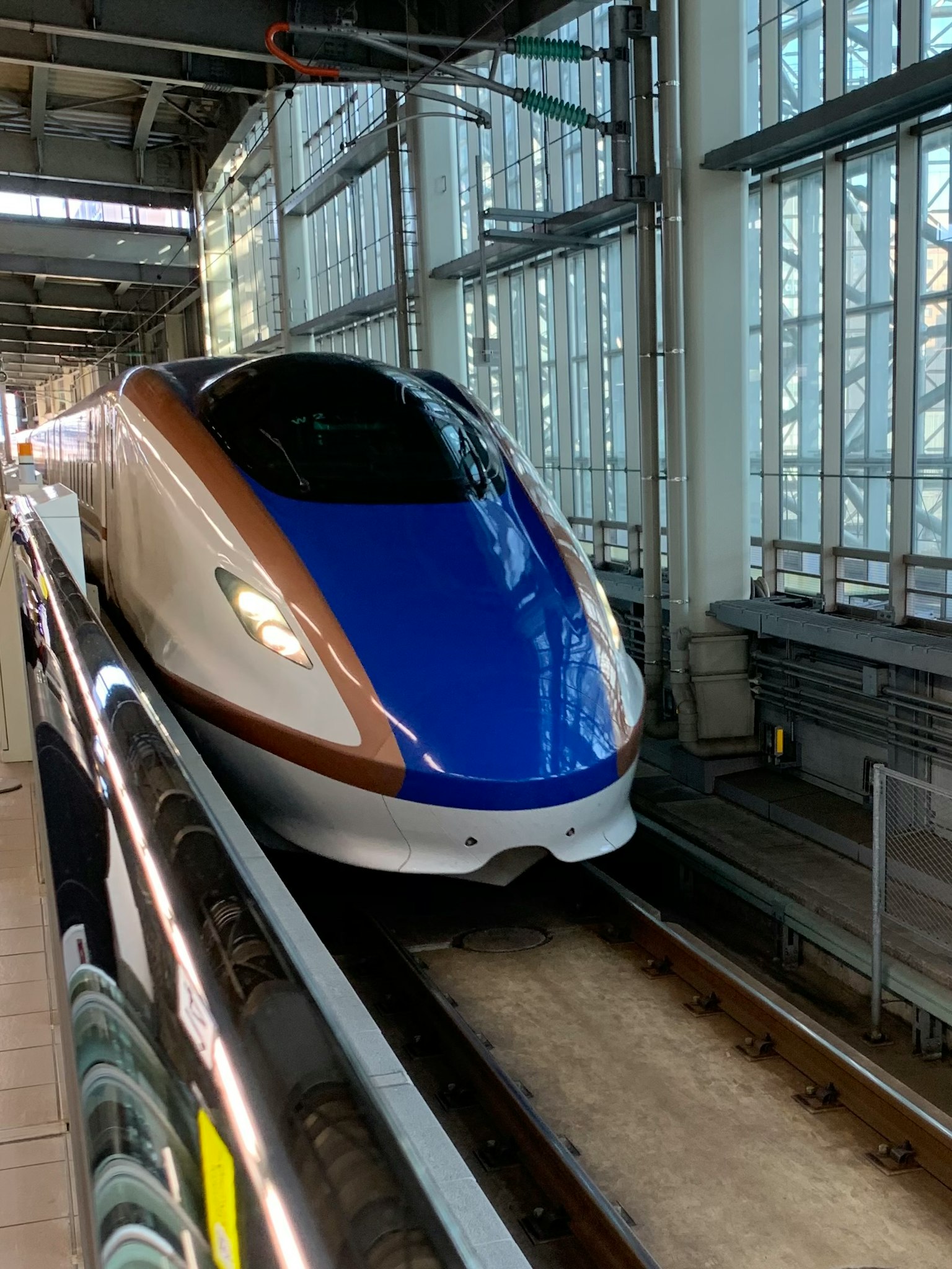 Shinkansen bullet train at a station platform