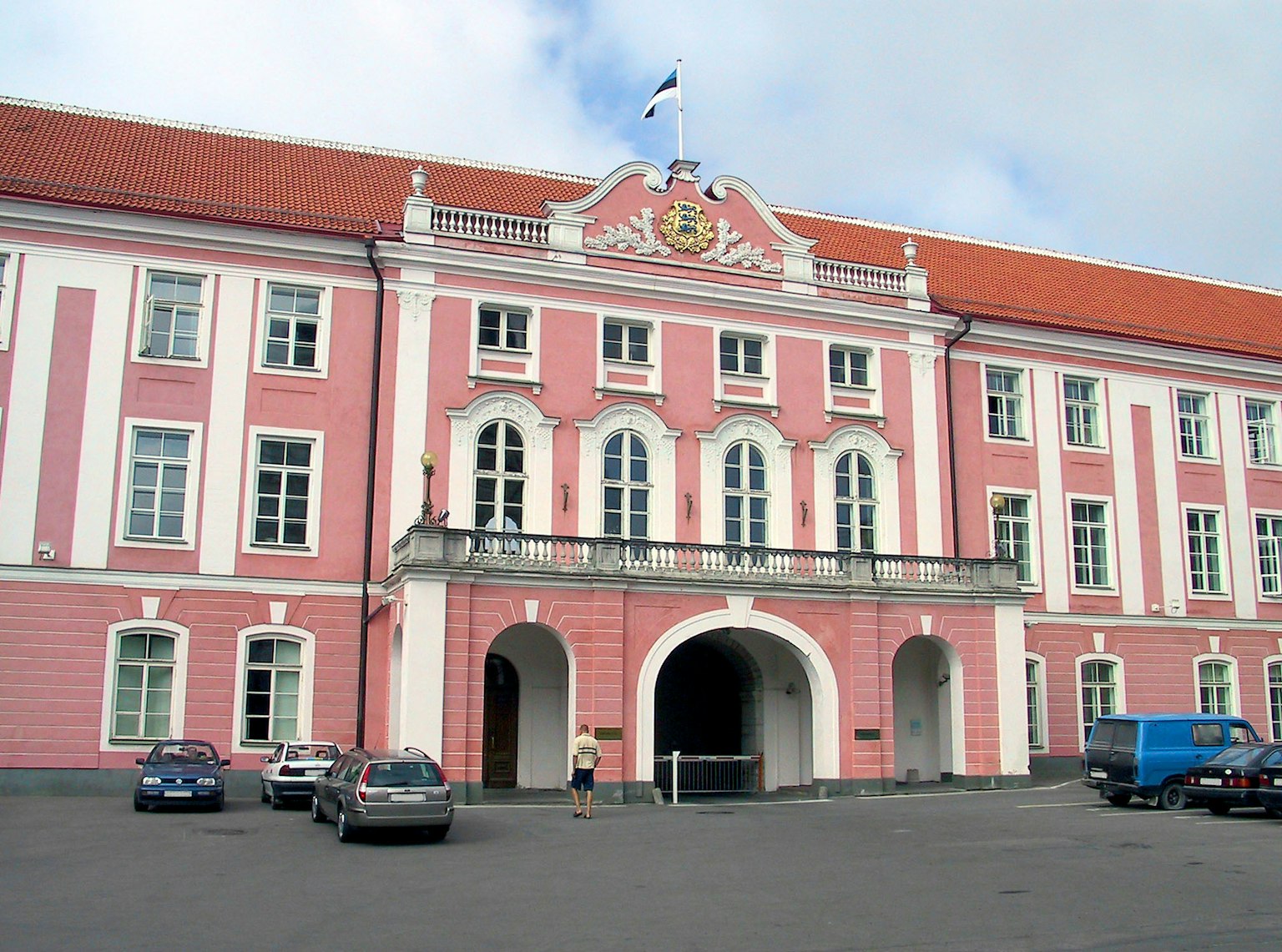 Front facade of a historic building with pink exterior