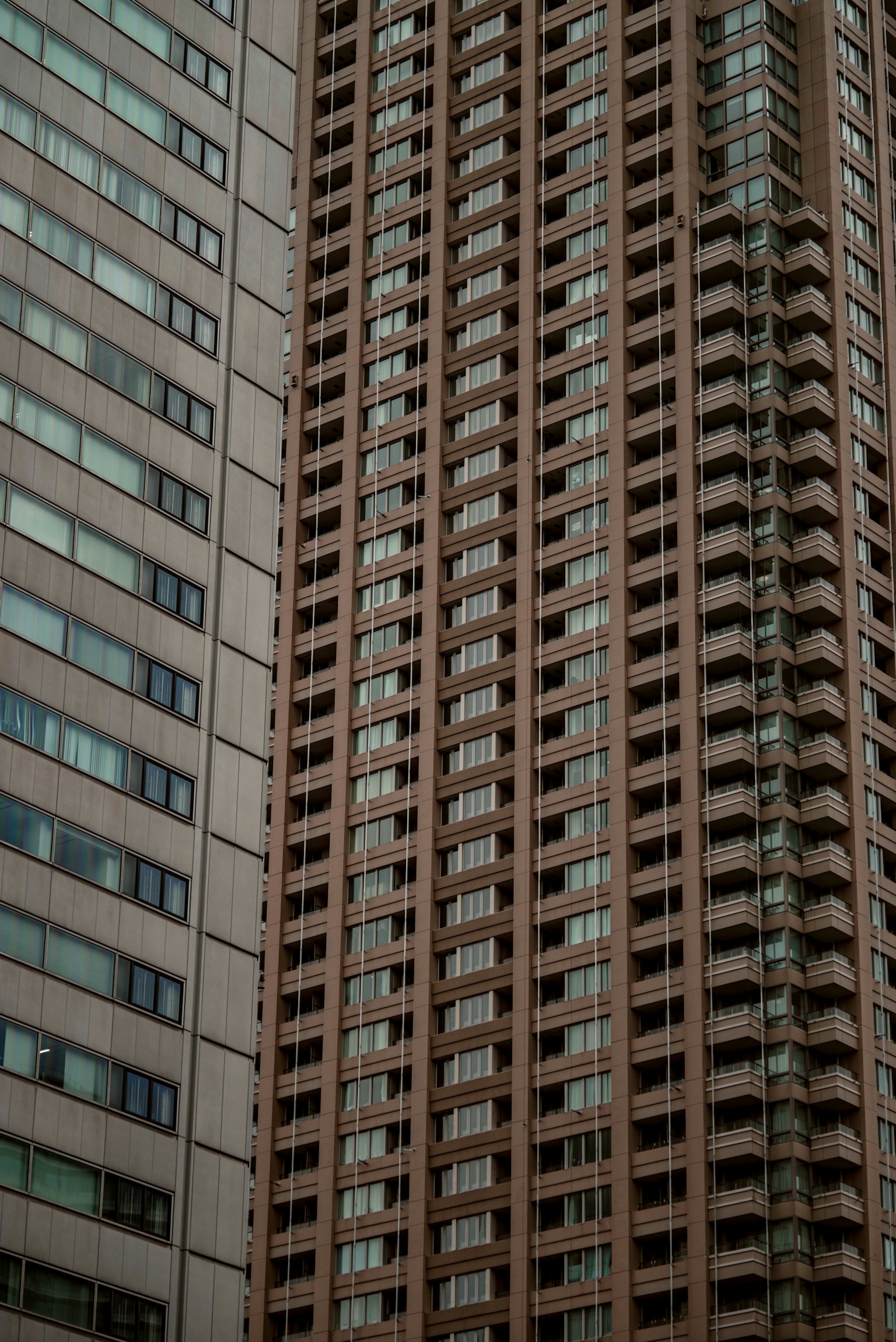 Facade of high-rise building showing window patterns and architectural design