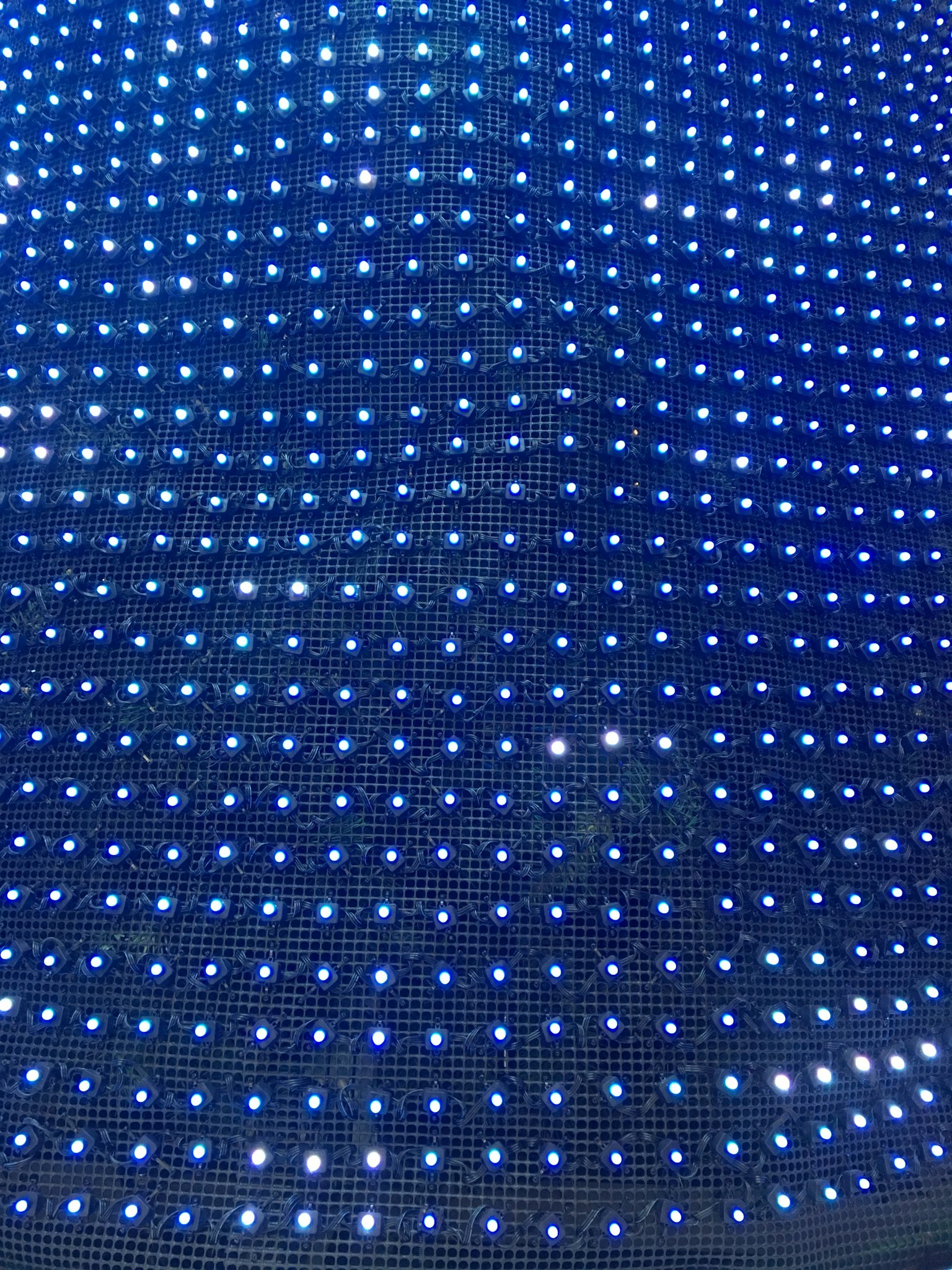 Pattern of evenly spaced blue LED lights