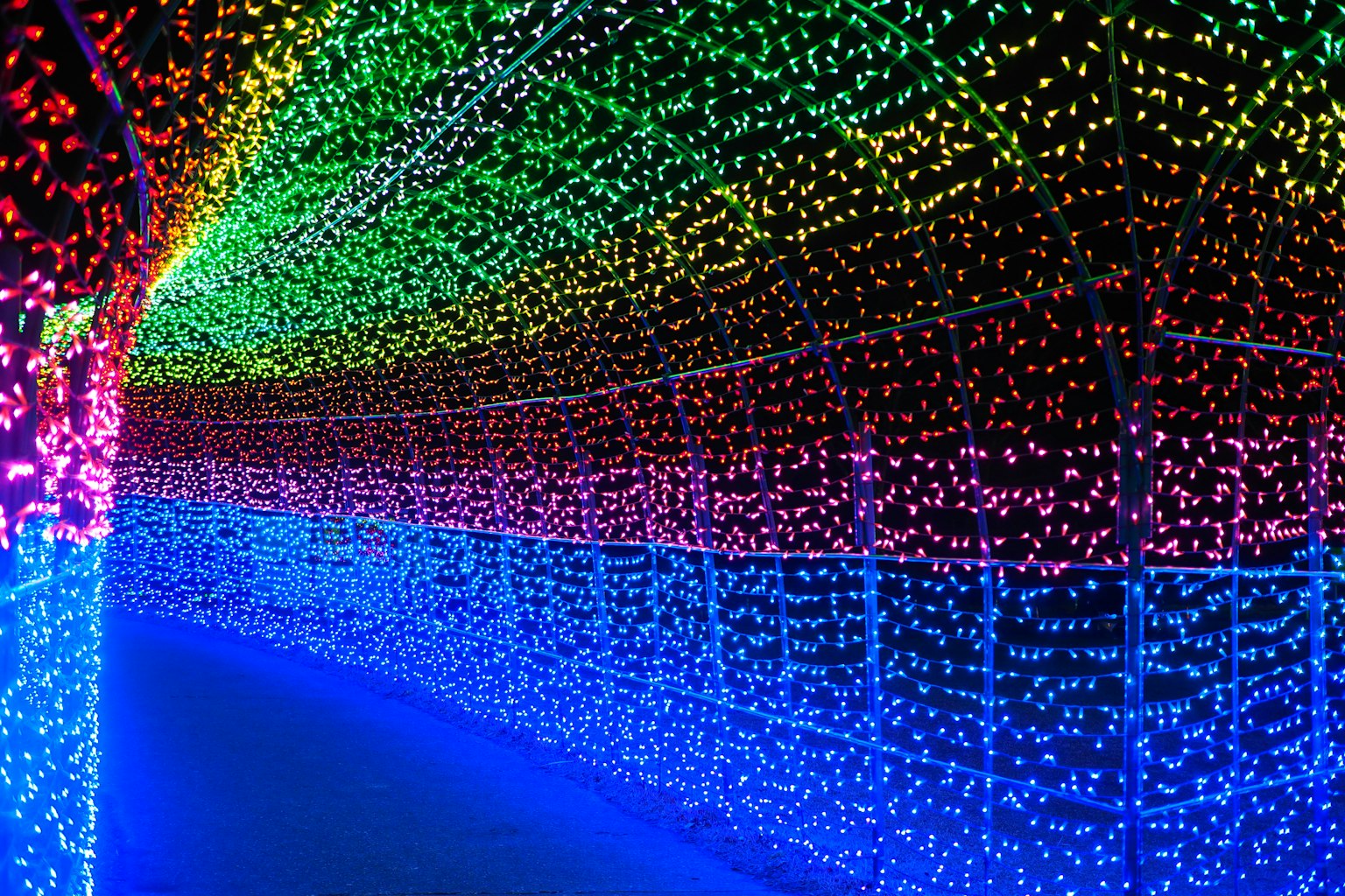 Interior of a tunnel illuminated with colorful LED lights