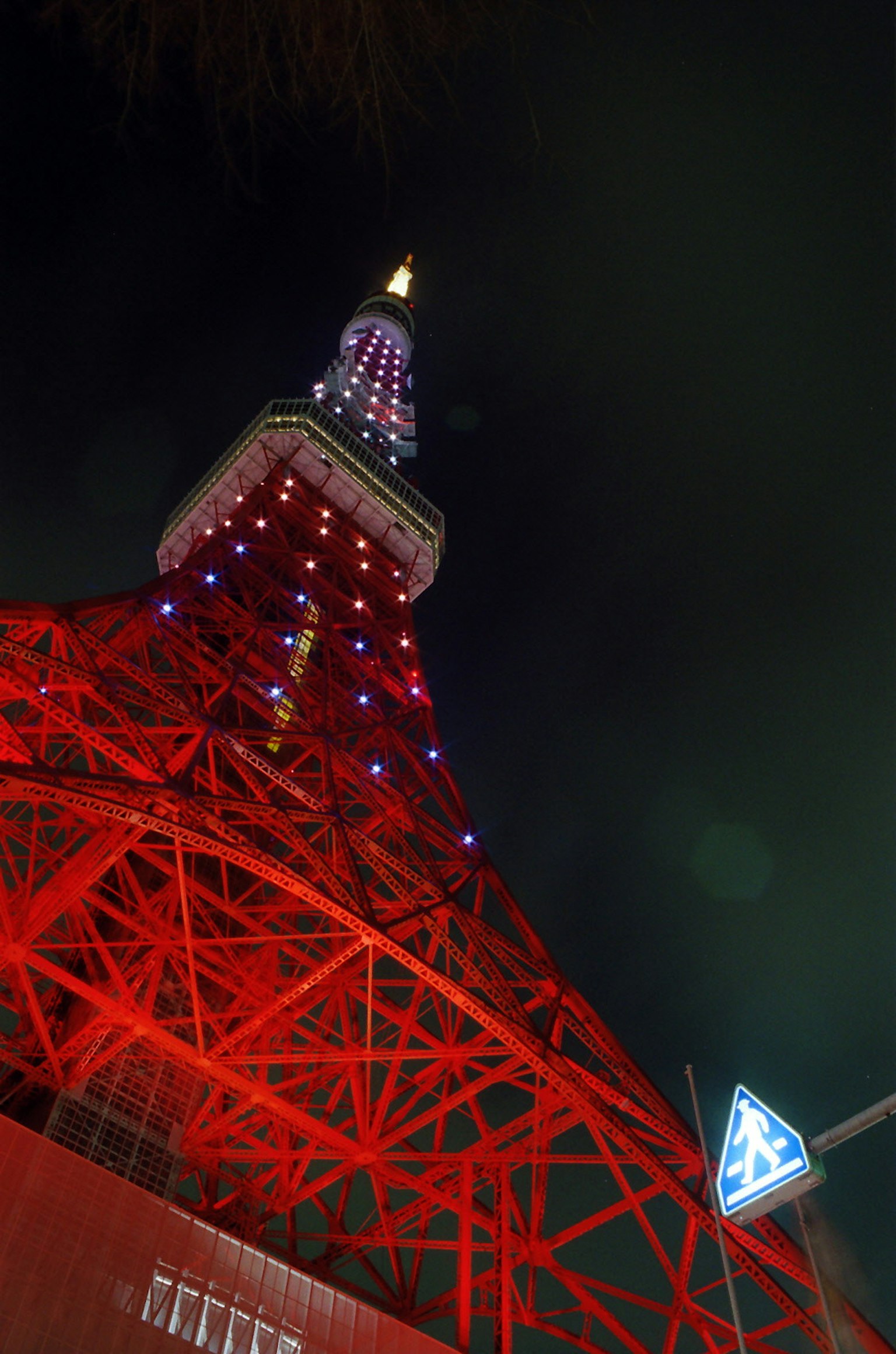Tokyo Tower at night featuring red steel structure and illuminated design