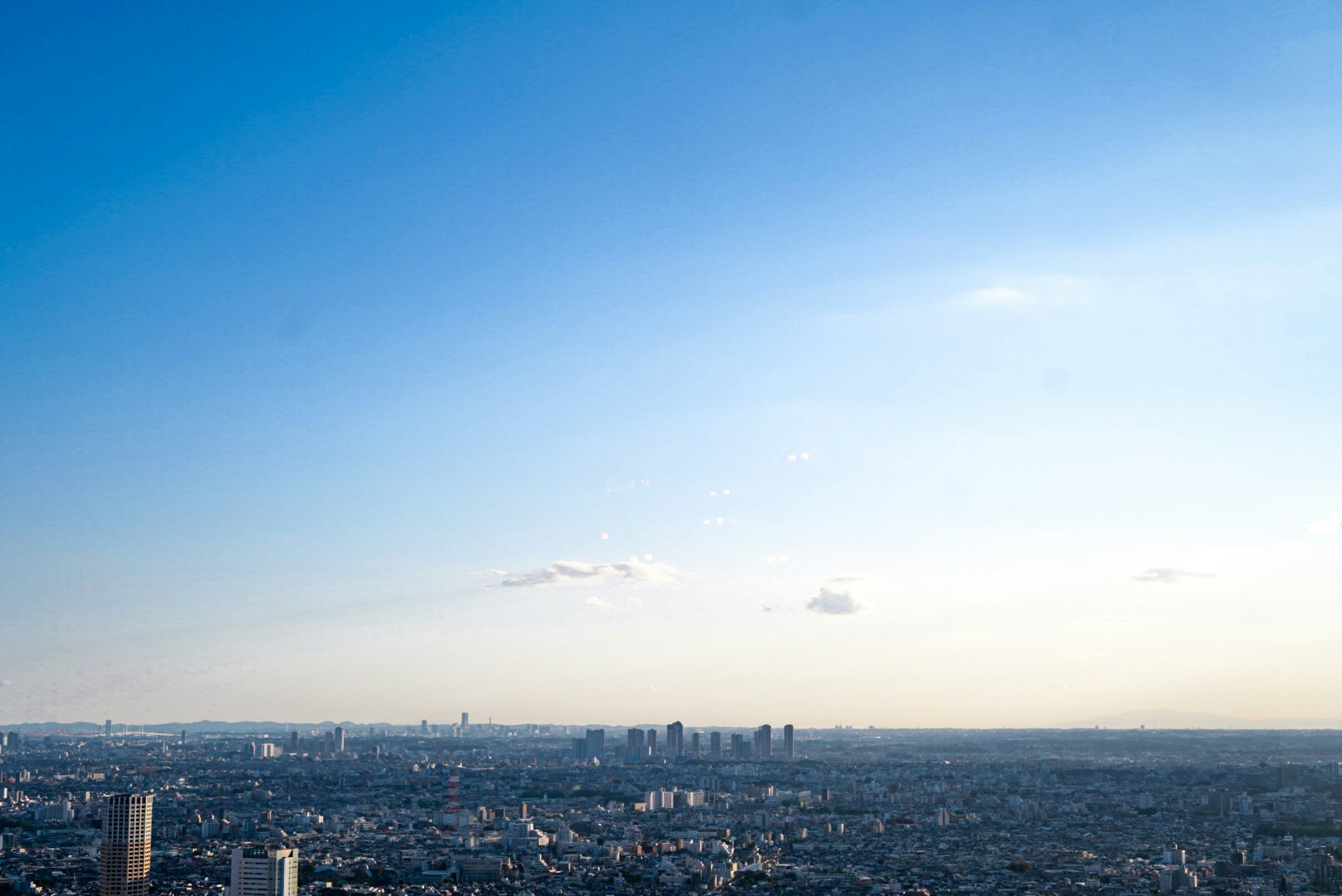 distant city skyline under a wide open sky image