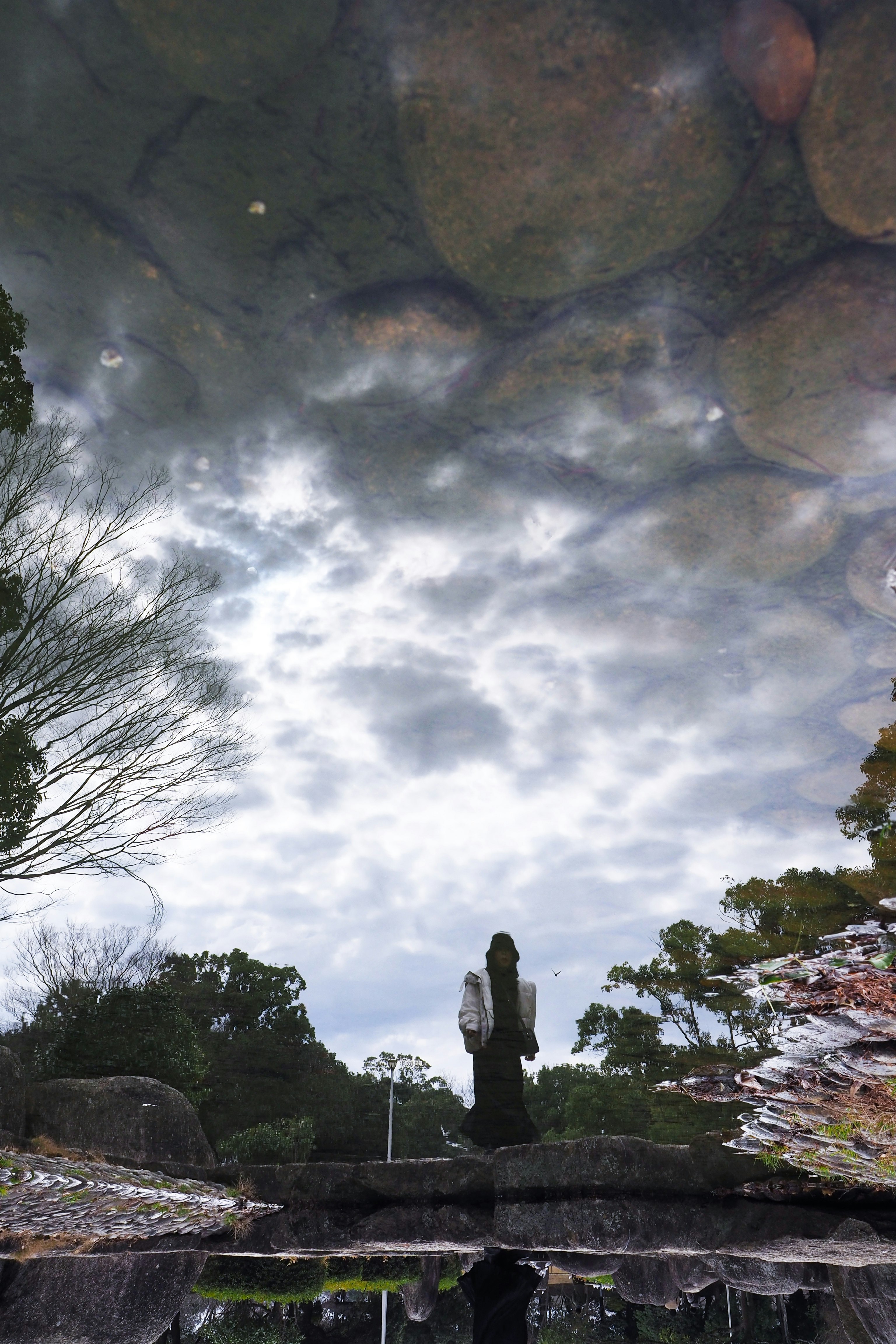 cloudy sky and river water suggesting sorrow in the river