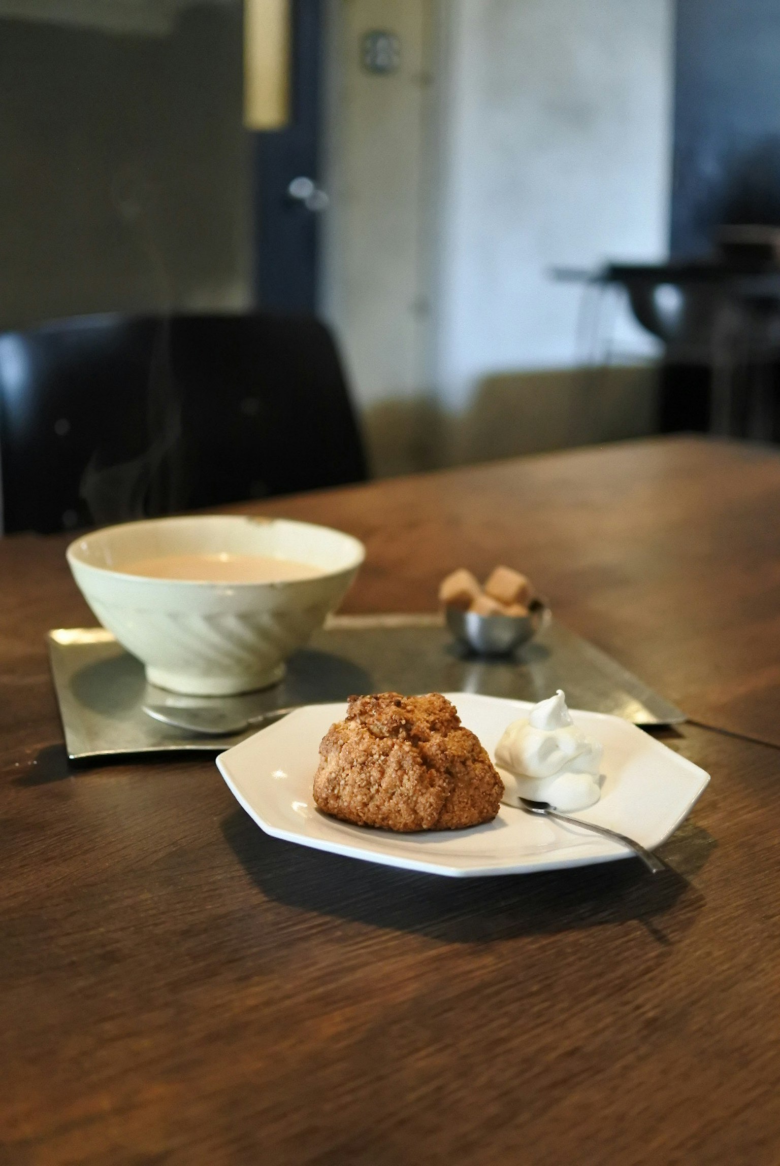 Coffee and pastry on a wooden table
