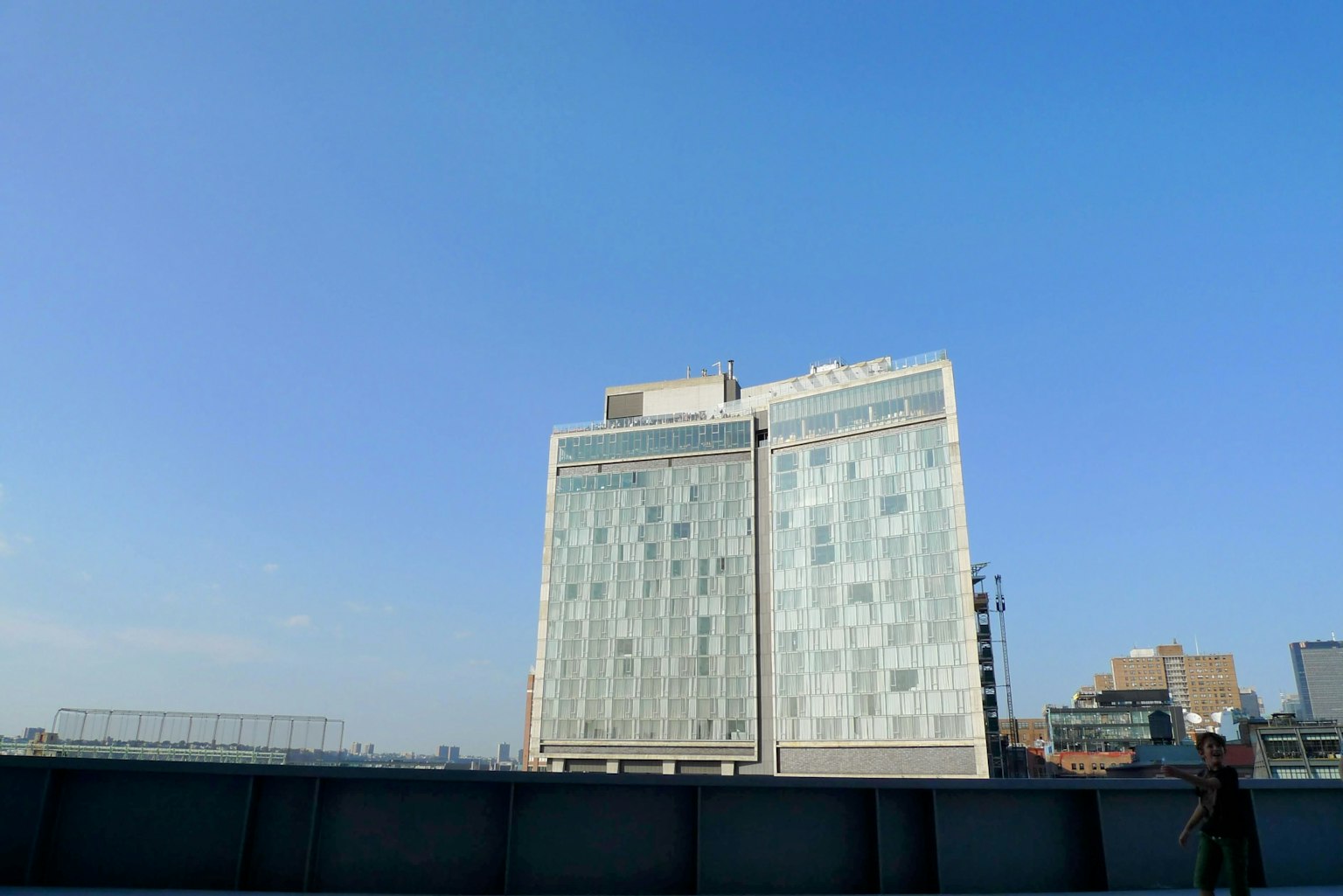 Modern building facade under a clear blue sky