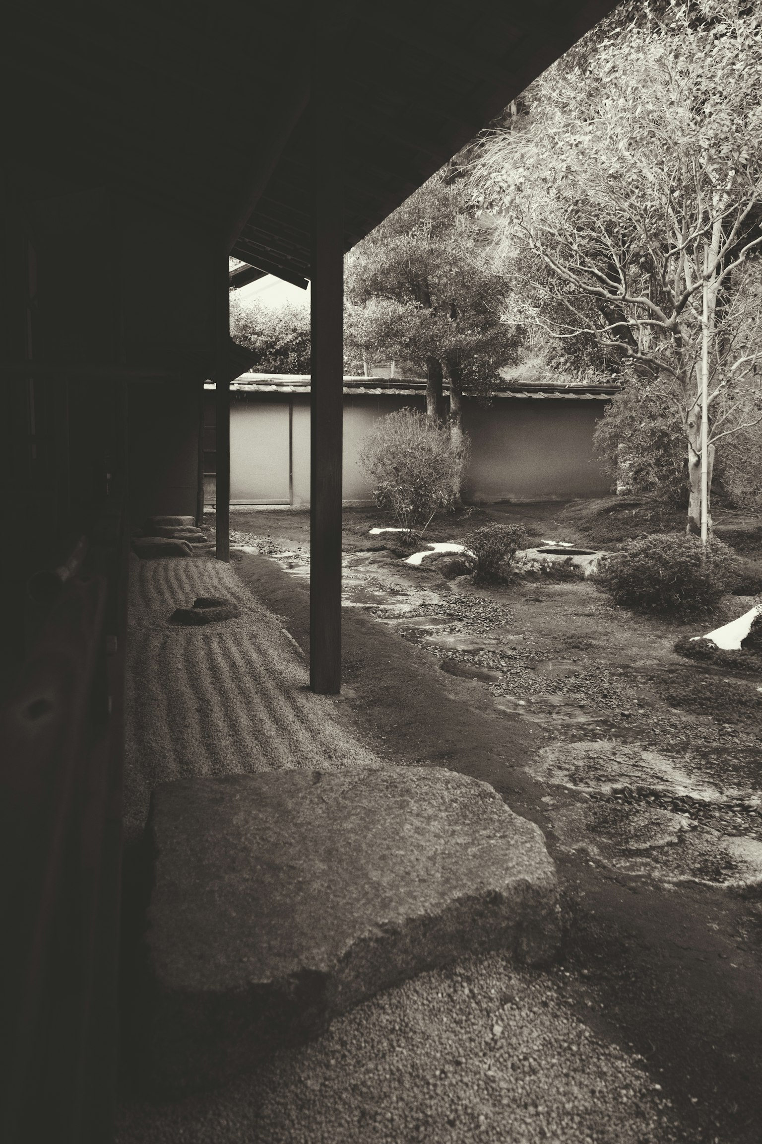 Serene view of a Japanese garden with wooden structure