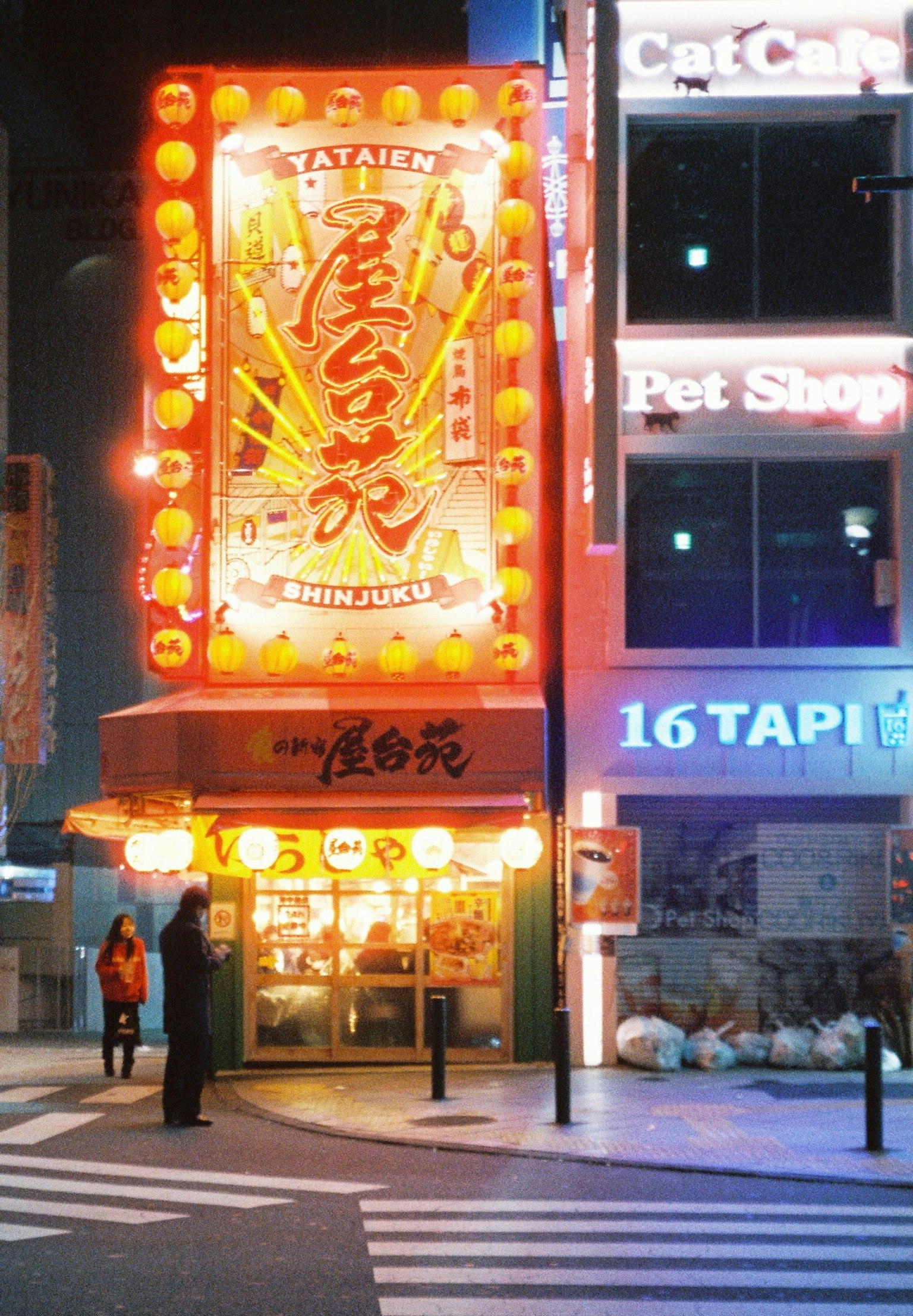 Exterior of a brightly lit Chinese restaurant at night