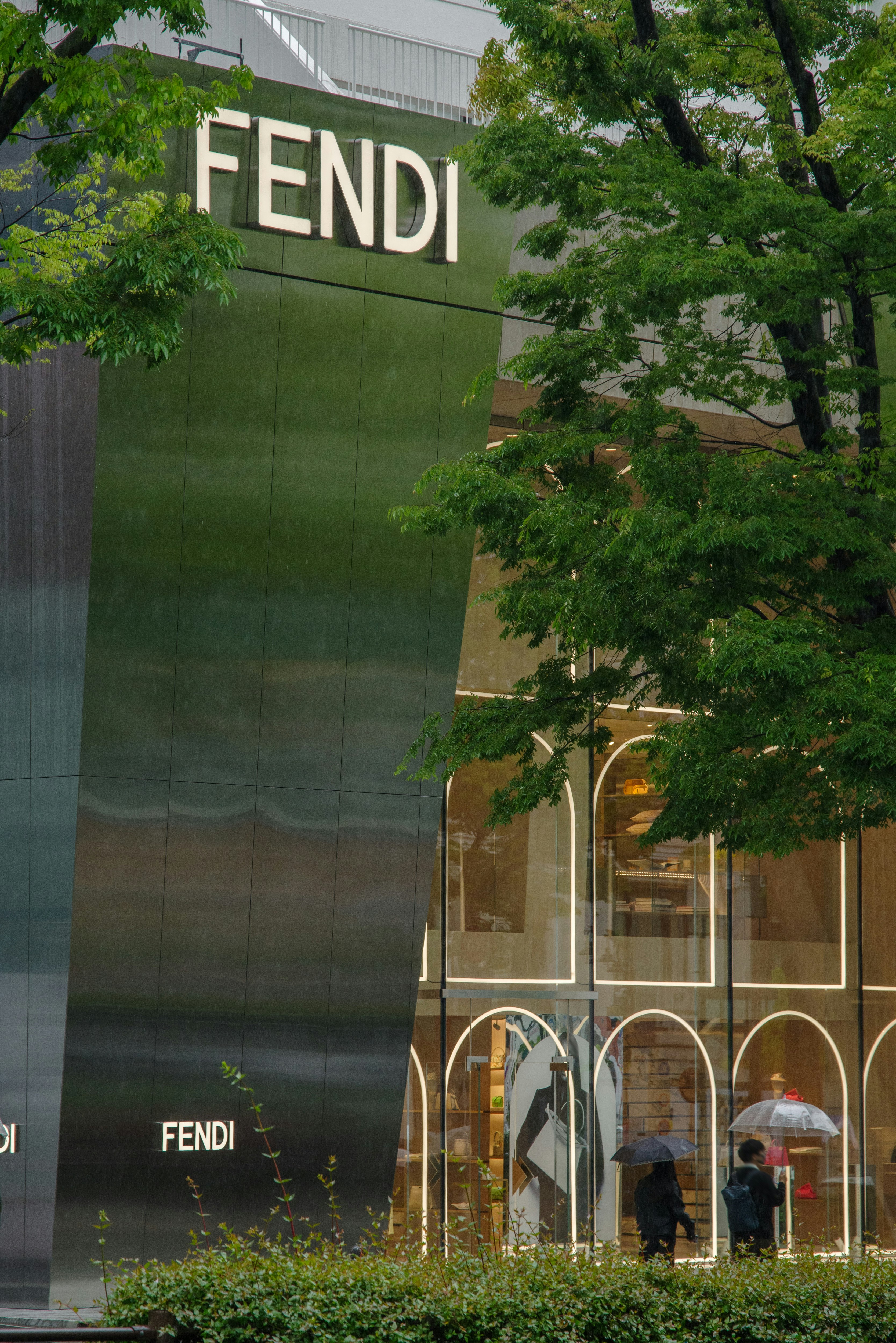 FENDI storefront exterior with trees in front