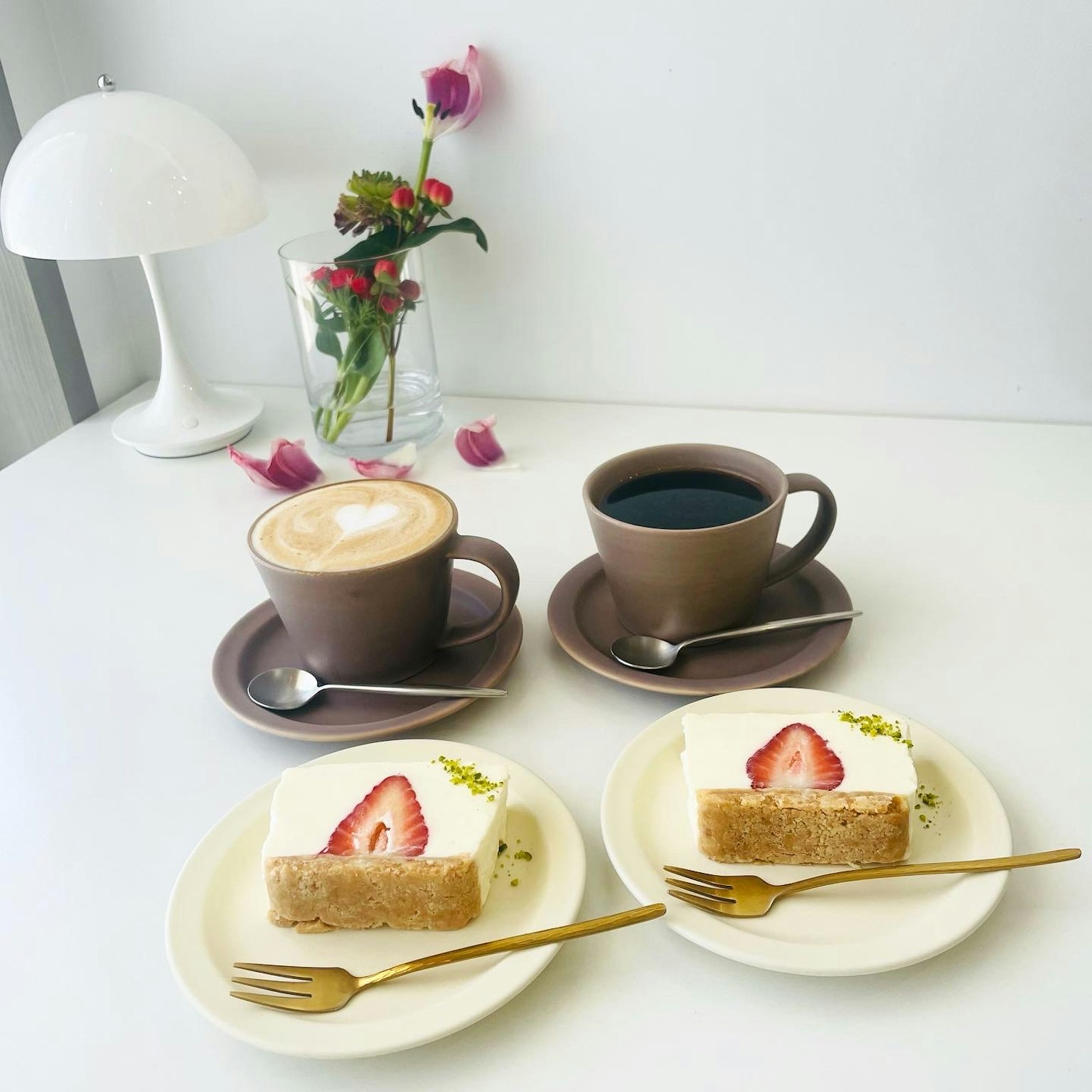 A beautiful table setting with coffee and cake