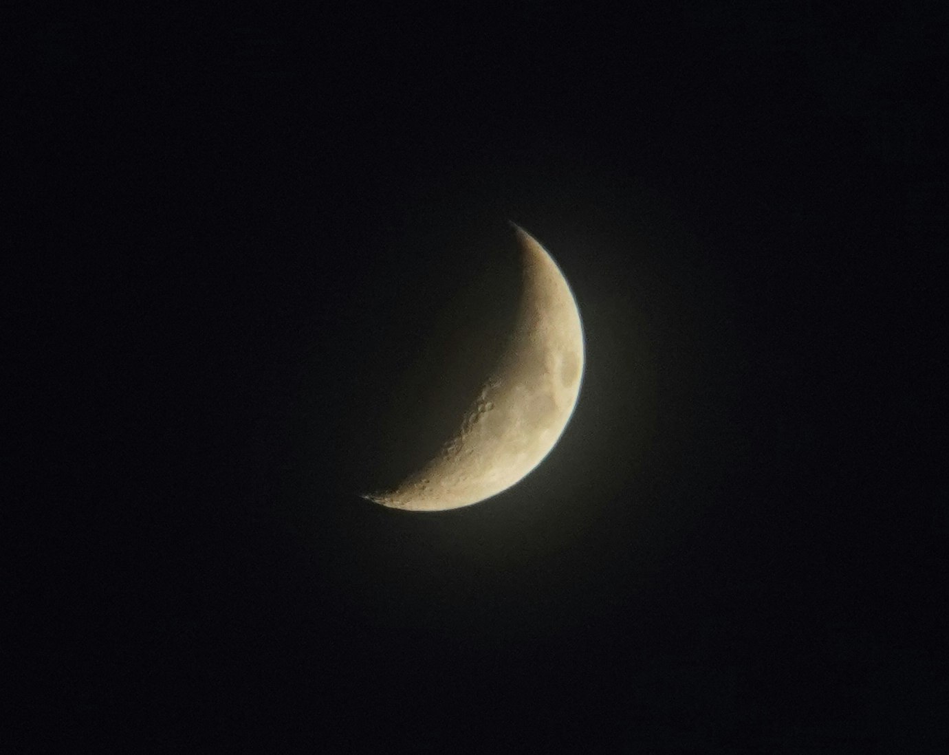 crescent moon against a dark sky