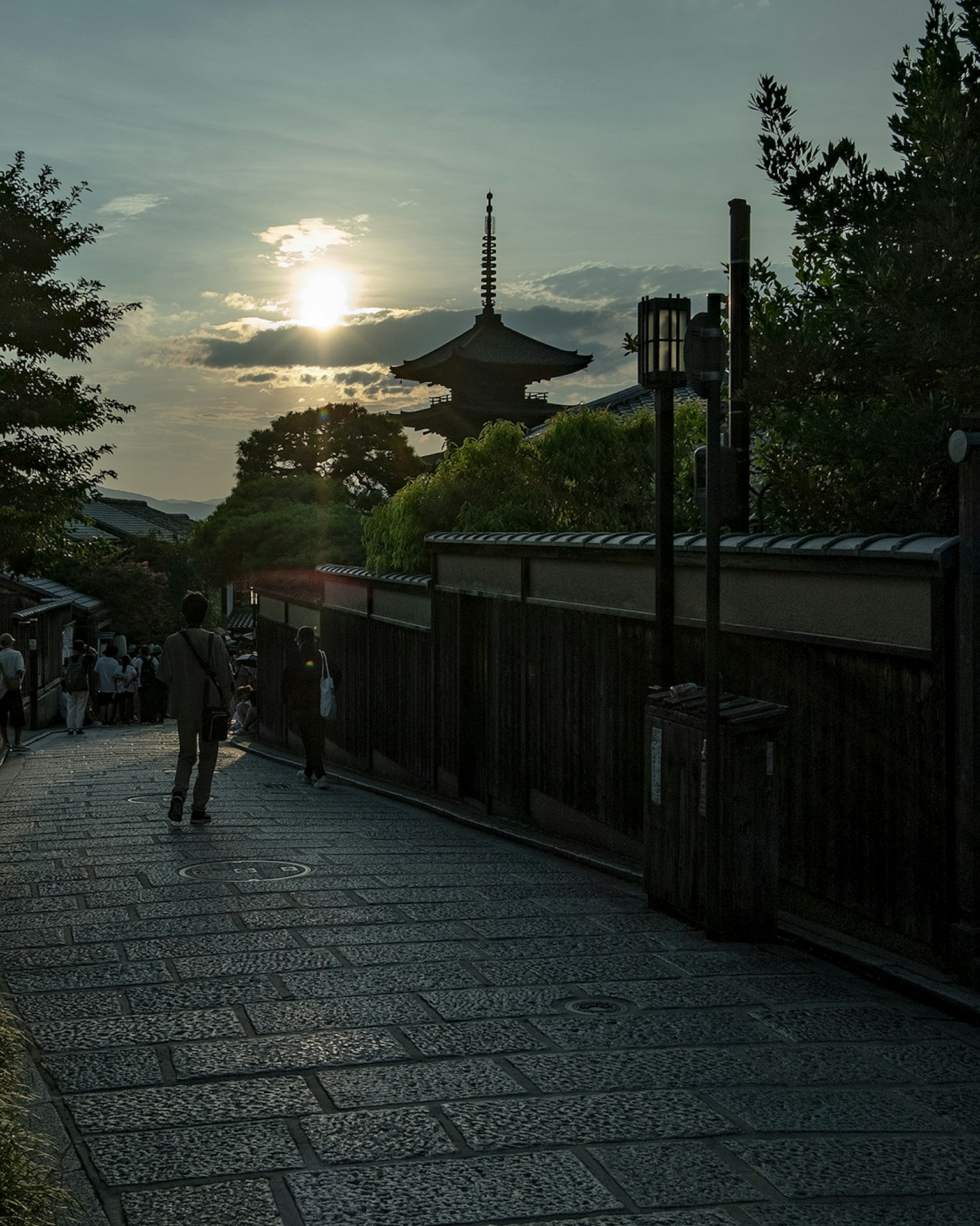 Sunset illuminating the streets of Kyoto with a pagoda in view